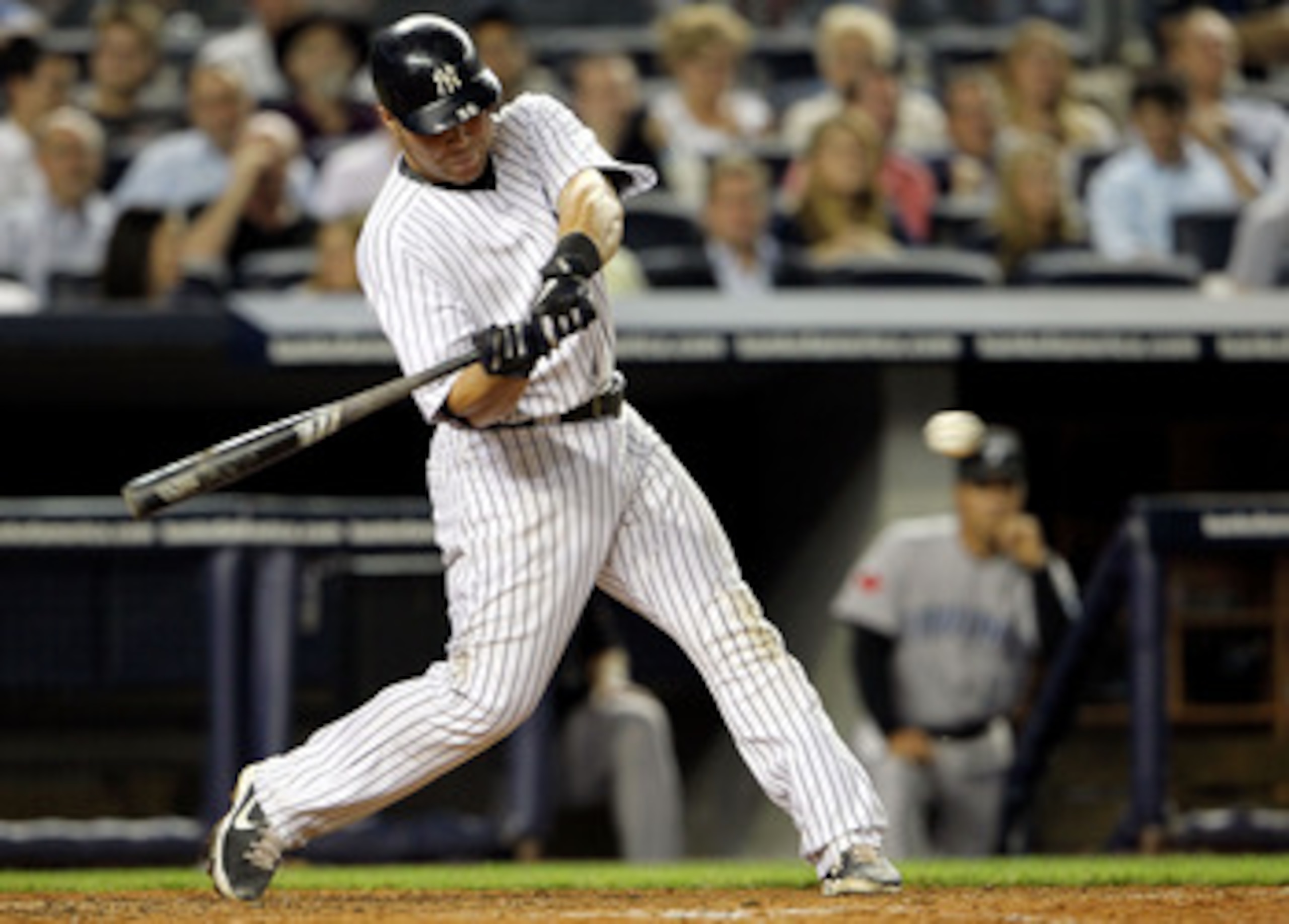 NEW YORK, NY - MAY 24: Russell Martin #55 of the New York Yankees hits an RBI single in the eighth inning against the Toronto Blue Jays at Yankee Stadium on May 24, 2011 in the Bronx borough of New York City. (Photo by Michael Heiman/Getty Images) NEW YORK, NY - MAY 24: Russell Martin #55 of the New York Yankees hits an RBI single in the eighth inning against the Toronto Blue Jays at Yankee Stadium on May 24, 2011 in the Bronx borough of New York City. (Photo by Michael Heiman/Getty Images)