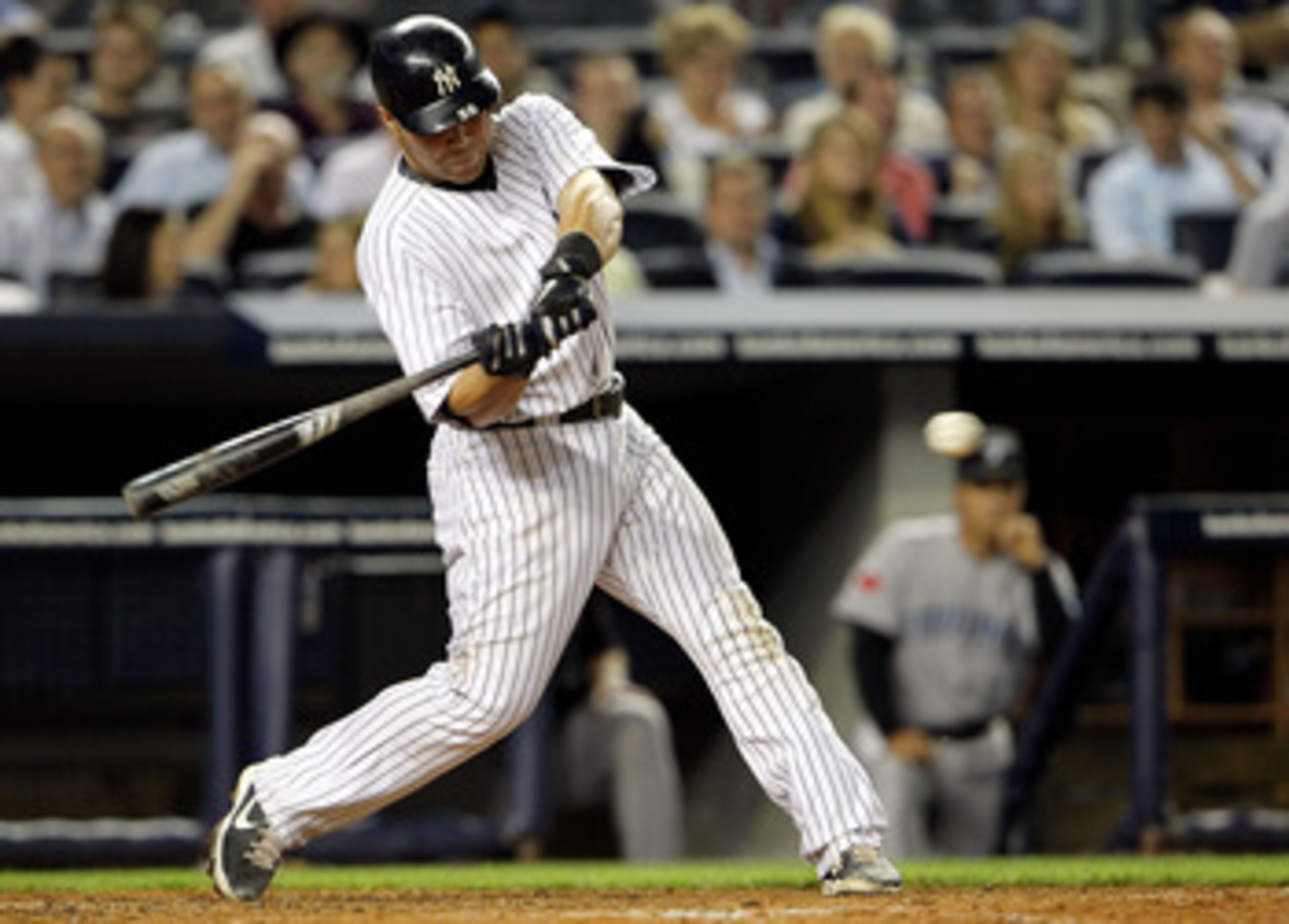 NEW YORK, NY - MAY 24:  Russell Martin #55 of the New York Yankees hits an RBI single in the eighth inning against the Toronto Blue Jays at Yankee Stadium on May 24, 2011 in the Bronx borough of New York City.  (Photo by Michael Heiman/Getty Images)