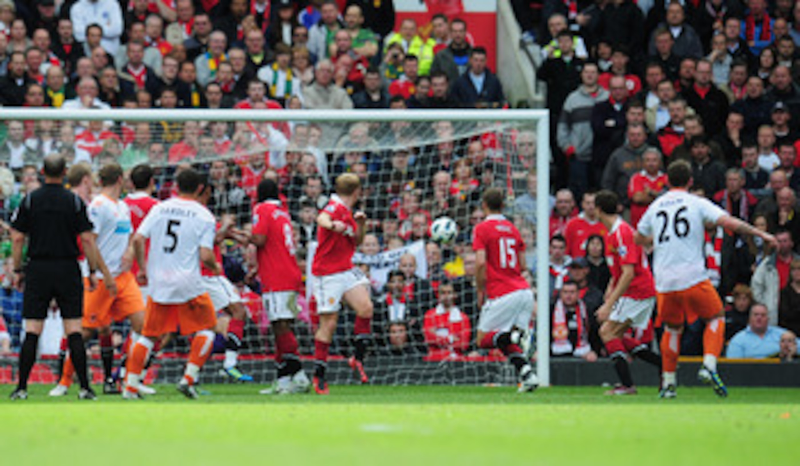 MANCHESTER, ENGLAND - MAY 22:  Charlie Adam of Blackpool (26) scores their first goal from a free kick during the Barclays Premier League match between Manchester United and Blackpool at Old Trafford on May 22, 2011 in Manchester, England.  (Photo by Shau