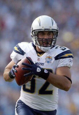 SAN DIEGO, CA - SEPTEMBER 27:  Free-Safety Eric Weddle #32 of the San Diego Chargers intercepts the ball and runs in back for a touchdown late in the fourth quarter against the Miami Dolphins at Qualcomm Stadium on September 27, 2009 in San Diego, Califor