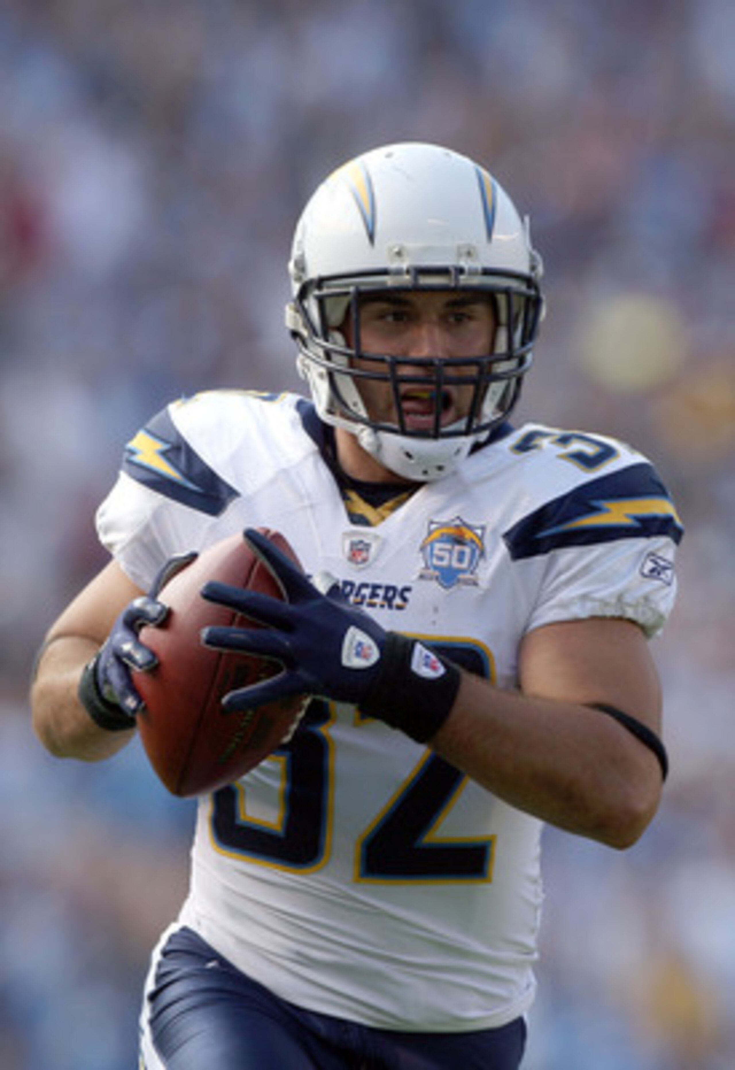 SAN DIEGO, CA - SEPTEMBER 27:  Free-Safety Eric Weddle #32 of the San Diego Chargers intercepts the ball and runs in back for a touchdown late in the fourth quarter against the Miami Dolphins at Qualcomm Stadium on September 27, 2009 in San Diego, Califor