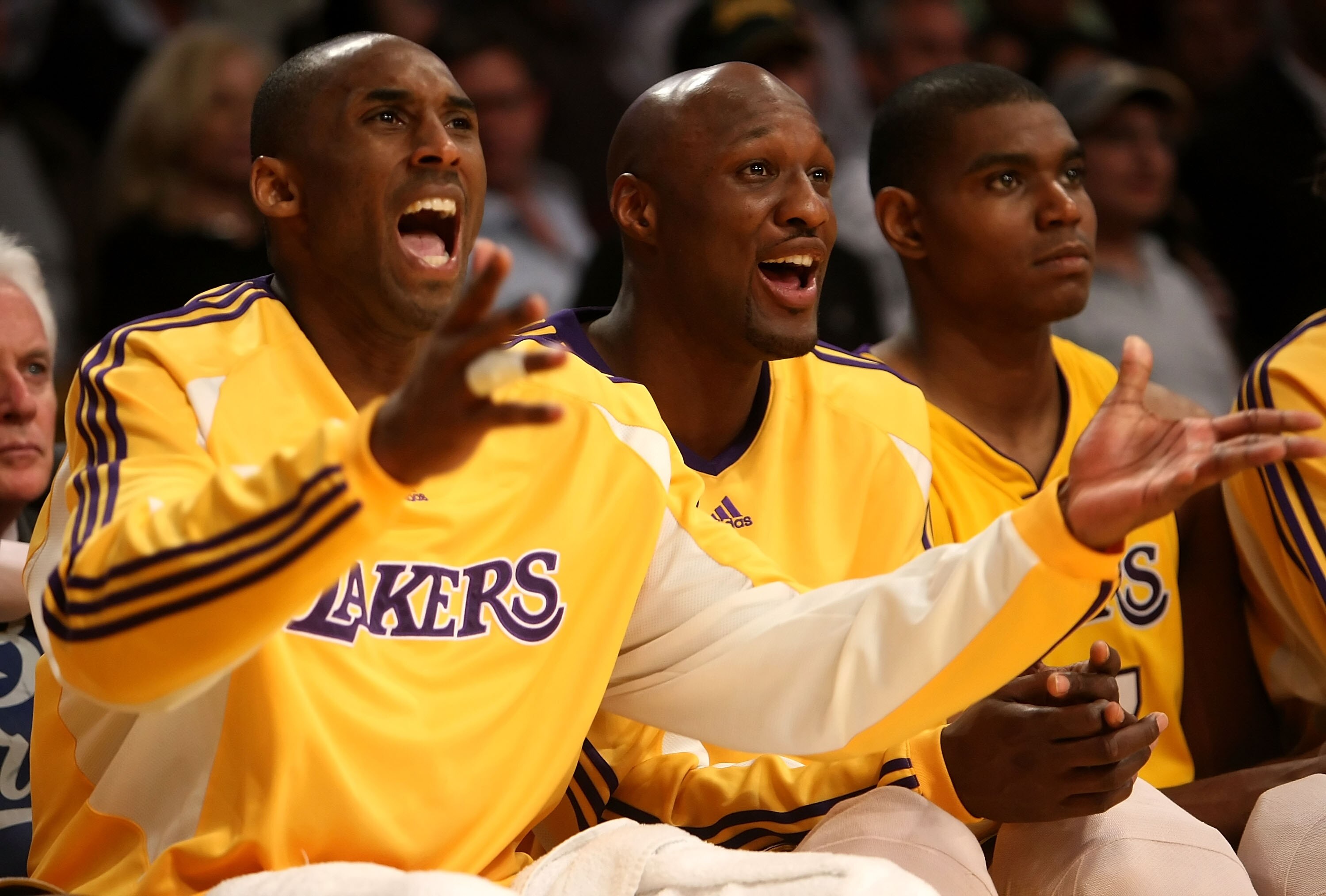 LOS ANGELES, CA - MAY 12:  (L-R) Kobe Bryant #24, Lamar Odom #7 and Andrew Bynum #17 of the Los Angeles Lakers sit on the bench late in the fourth quarter against the Houston Rockets in Game Five of the Western Conference Semifinals during the 2009 NBA Pl
