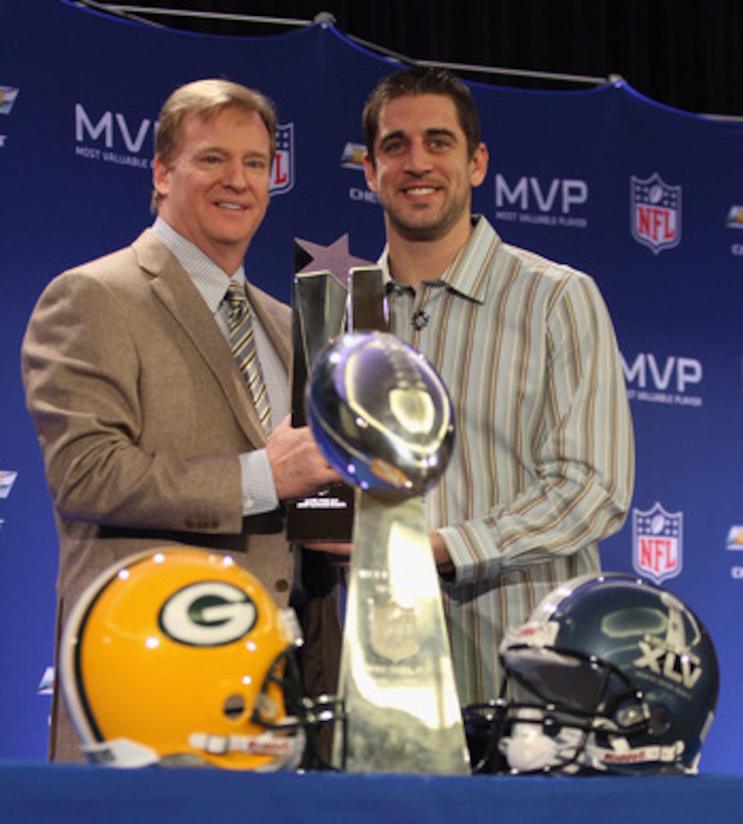 DALLAS, TX - FEBRUARY 07: NFL Commissioner Roger Goodell (L) and Green Bay Packers quarterback Aaron Rodgers (R) pose with the MVP trophy after speaking to the media during a press conference at Super Bowl XLV Media Center on February 7, 2011 in Dallas, DALLAS, TX - FEBRUARY 07: NFL Commissioner Roger Goodell (L) and Green Bay Packers quarterback Aaron Rodgers (R) pose with the MVP trophy after speaking to the media during a press conference at Super Bowl XLV Media Center on February 7, 2011 in Dallas,