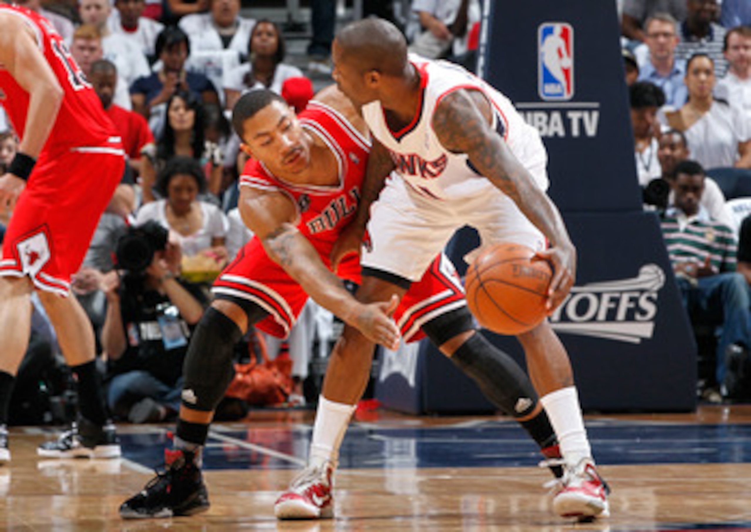 ATLANTA, GA - MAY 12: Derrick Rose #1 of the Chicago Bulls defends against Jamal Crawford #11 of the Atlanta Hawks in Game Six of the Eastern Conference Semifinals in the 2011 NBA Playoffs at Phillips Arena on May 12, 2011 in Atlanta, Georgia. NOTE TO U ATLANTA, GA - MAY 12: Derrick Rose #1 of the Chicago Bulls defends against Jamal Crawford #11 of the Atlanta Hawks in Game Six of the Eastern Conference Semifinals in the 2011 NBA Playoffs at Phillips Arena on May 12, 2011 in Atlanta, Georgia. NOTE TO U