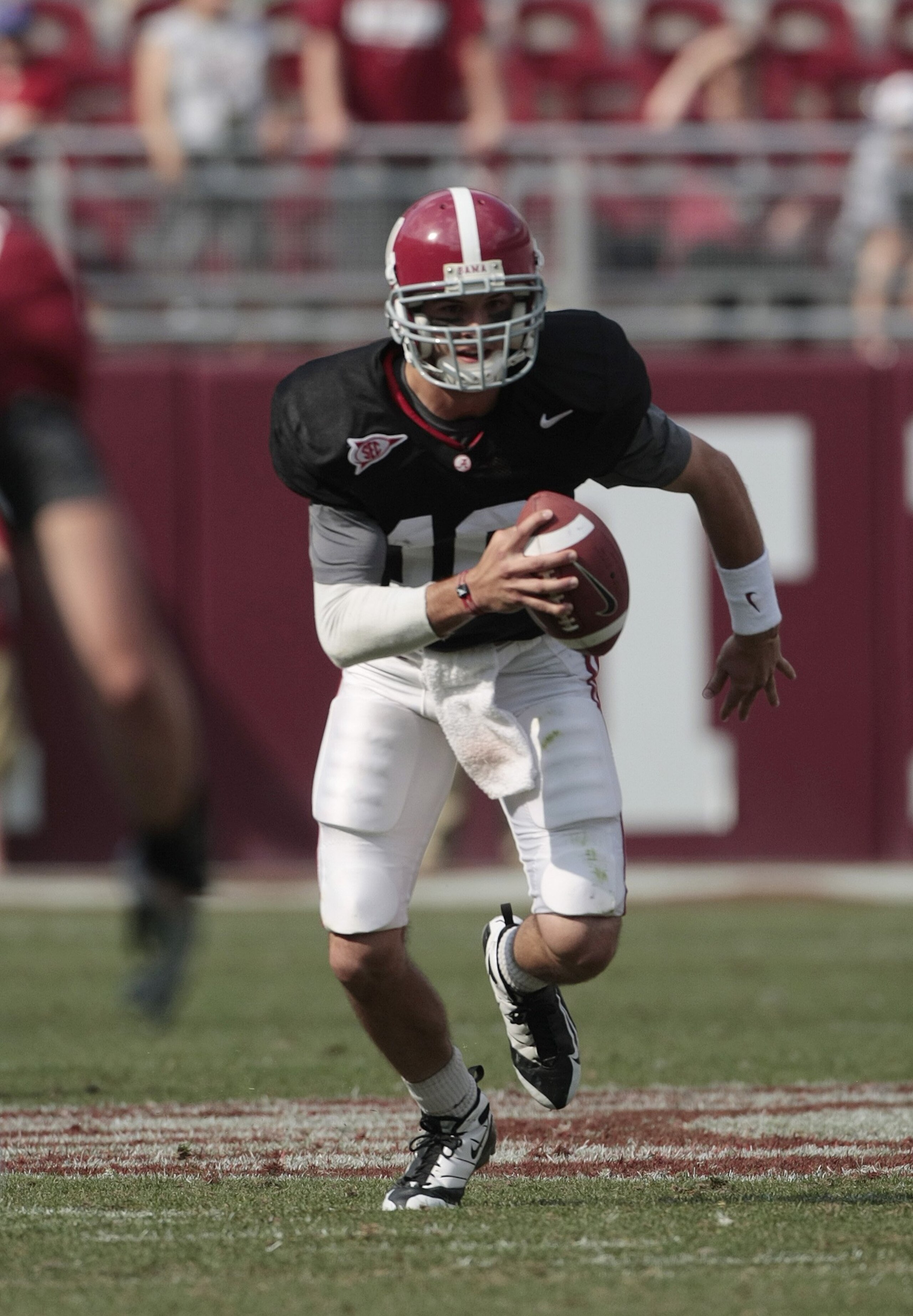 TUSCALOOSA, AL - APRIL 17: Quarterback A. J. McCarron #10 of the Alabama Crimson Tide runs for a first down during the Alabama spring game at Bryant Denny Stadium on April 17, 2010 in Tuscaloosa, Alabama. (Photo by Dave Martin/Getty Images)