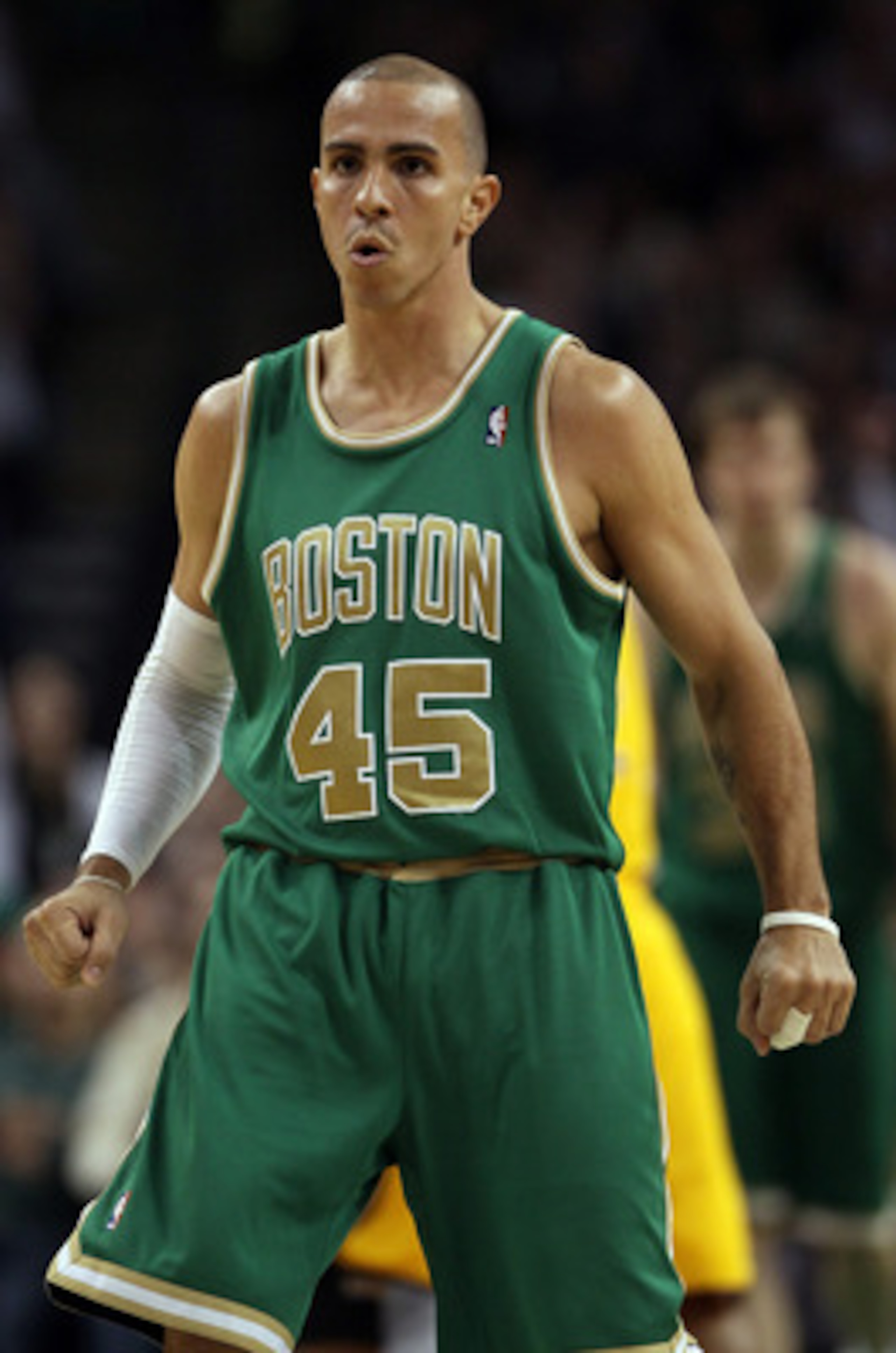 BOSTON, MA - MARCH 16:  Carlos Arroyo #45 of the Boston Celtics celebrates his basket in the second half against the Indiana Pacers on March 16, 2011 at the TD Garden in Boston, Massachusetts. The Celtics defeated the Indiana Pacers 92-80. NOTE TO USER: U