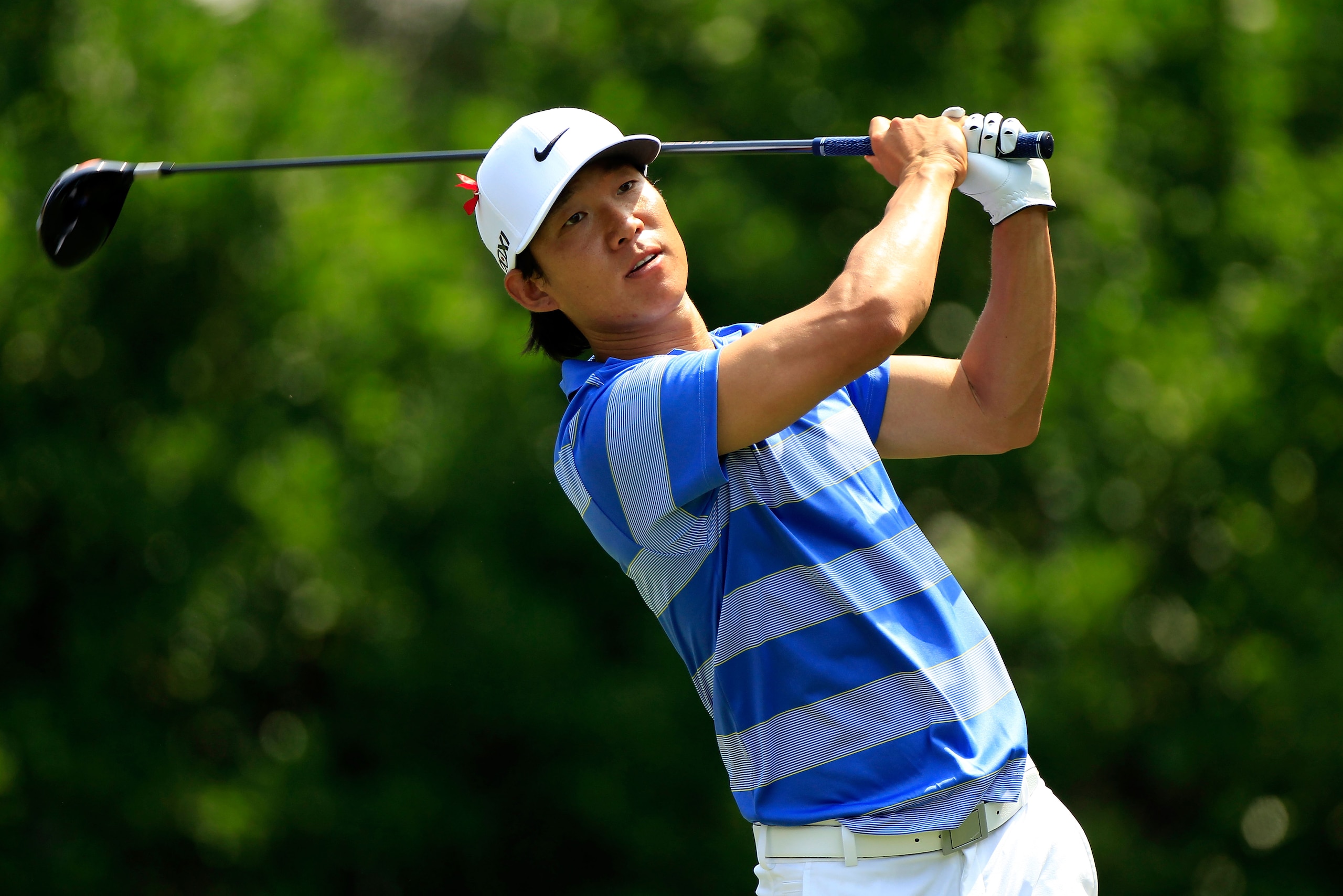 PONTE VEDRA BEACH, FL - MAY 13:  Anthony Kim hits his tee shot on the 11th hole during the second round of THE PLAYERS Championship held at THE PLAYERS Stadium course at TPC Sawgrass on May 13, 2011 in Ponte Vedra Beach, Florida.  (Photo by Sam Greenwood/