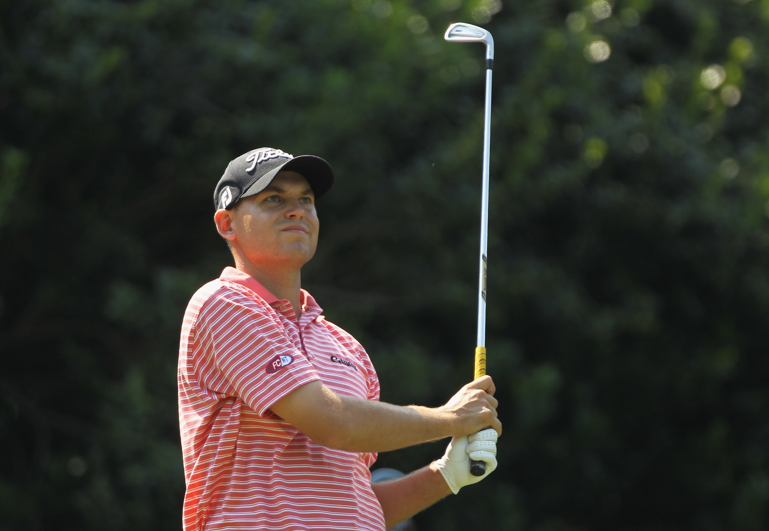 CHARLOTTE, NC - MAY 08:  Bill Haas watches his tee shot on the 13th hole during the final round of the Wells Fargo Championship at the Quail Hollow Club on May 8, 2011 in Charlotte, North Carolina.  (Photo by Scott Halleran/Getty Images)