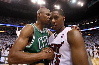 MIAMI, FL - MAY 11: Mario Chalmers #15 of the Miami Heat is congratulated by Ray Allen #20 of the Boston Celtics after Game Five of the Eastern Conference Semifinals of the 2011 NBA Playoffs at American Airlines Arena on May 11, 2011 in Miami, Florida. NO