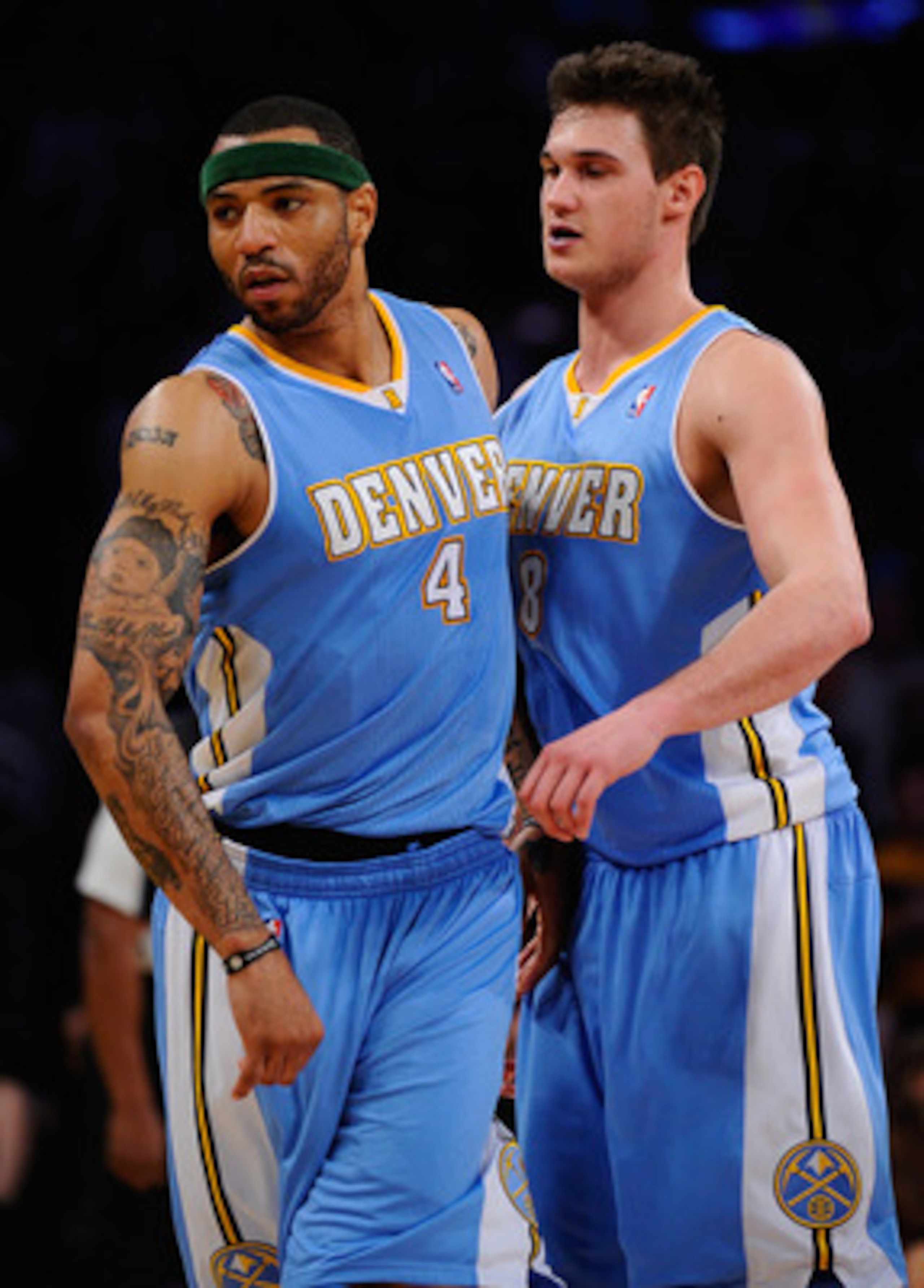 LOS ANGELES, CA - APRIL 03:  Kenyon Martin #4 of the Denver Nuggets celebrates with teammate Danilo Gallinari #8 after scoring a basket against the Los Angeles Lakers during the NBA basketball game at Staples Center on April 3, 2011 in Los Angeles, Califo