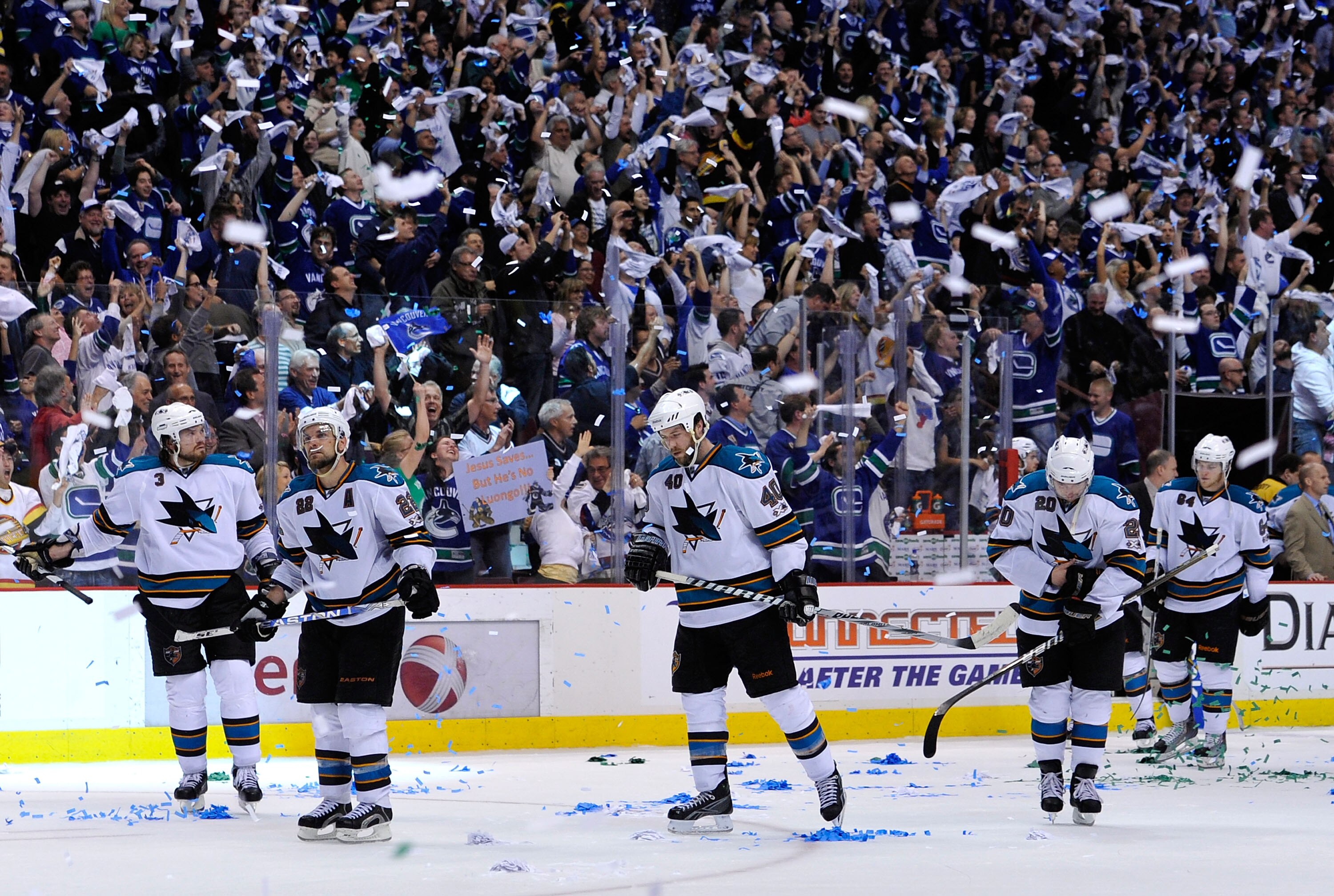 VANCOUVER, CANADA - MAY 24:  (L-R) Douglas Murray #3, Dan Boyle #22, Kent Huskins #40, Kyle Wellwood #20 and Jamie McGinn #64 of the San Jose Sharks look on after losing Game Five of the Western Conference Finals 3-2 in the second overtime to the Vancouve