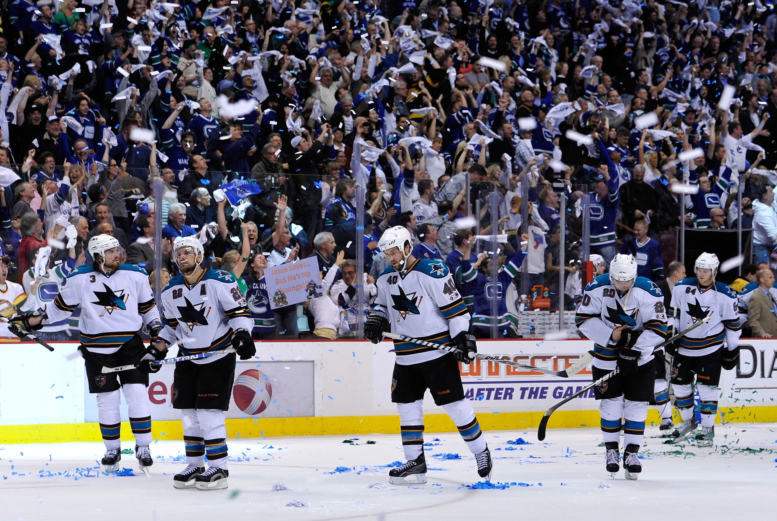 VANCOUVER, CANADA - MAY 24:  (L-R) Douglas Murray #3, Dan Boyle #22, Kent Huskins #40, Kyle Wellwood #20 and Jamie McGinn #64 of the San Jose Sharks look on after losing Game Five of the Western Conference Finals 3-2 in the second overtime to the Vancouve