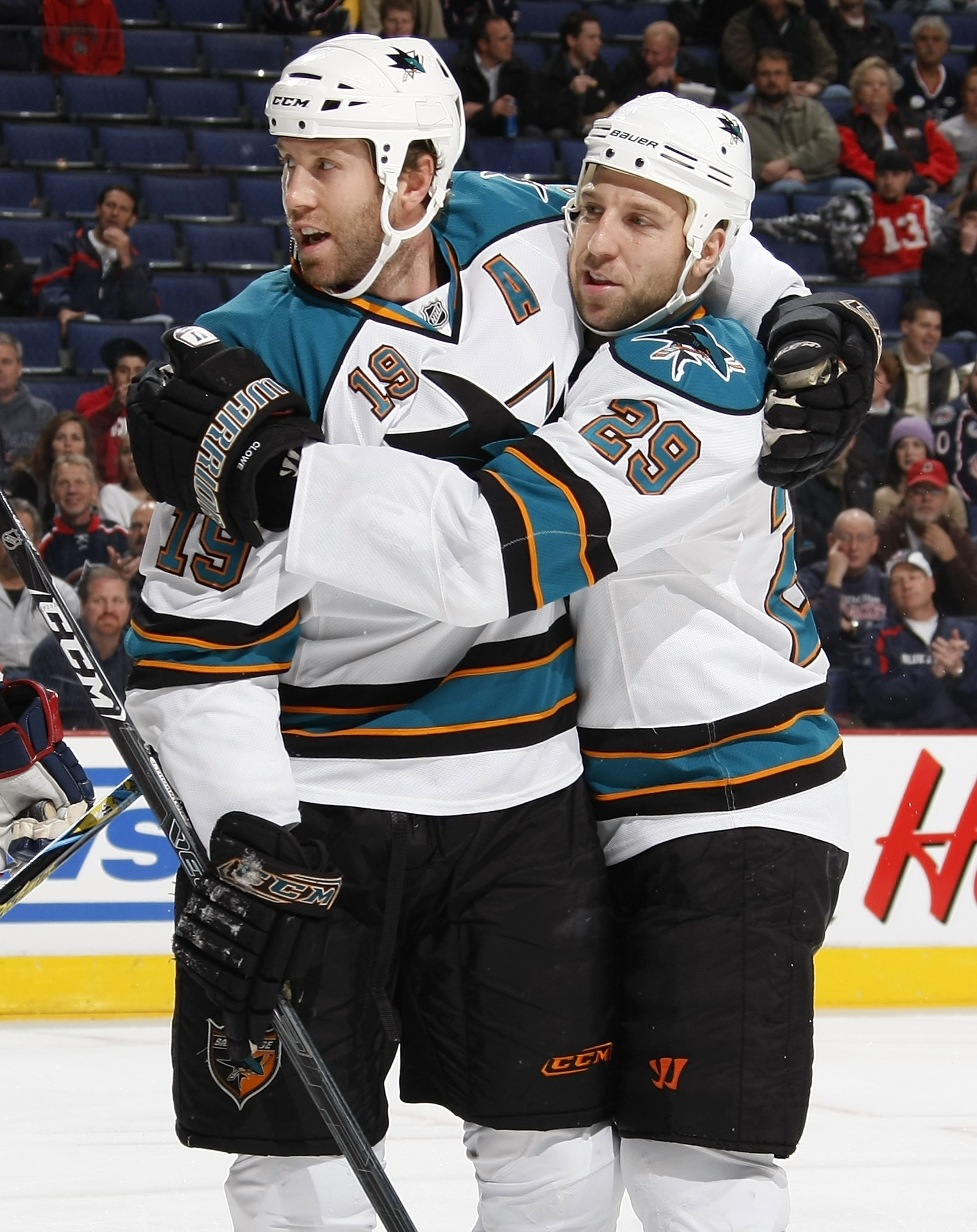 COLUMBUS, OH - NOVEMBER 04: Joe Thornton #19 of the San Jose Sharks celebrates his first-period goal with Ryane Clowe #29 during NHL action against the Columbus Blue Jackets on November 4, 2009 at Nationwide Arena in Columbus, Ohio.  (Photo by Gregory Sha
