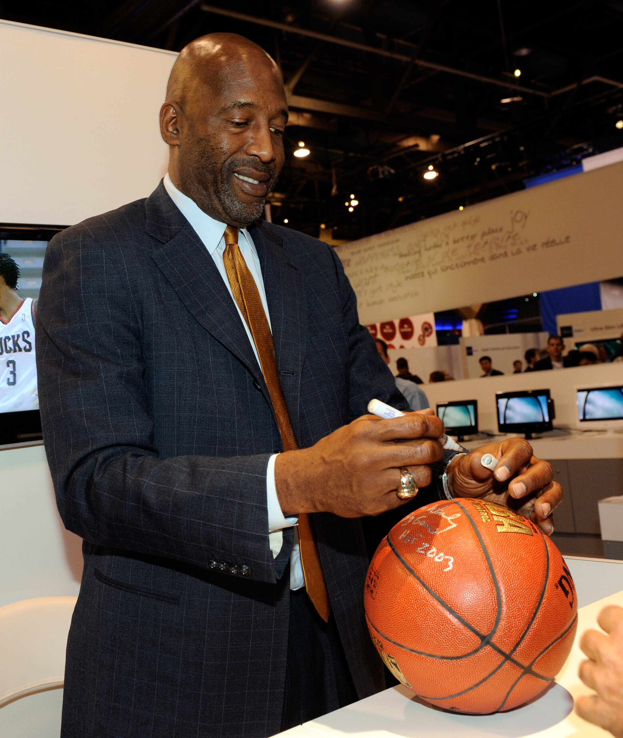 LAS VEGAS - JANUARY 07:  Former NBA basketball player James Worthy signs autographs at the Haier booth at the 2010 International Consumer Electronics Show at the Las Vegas Convention Center January 7, 2010 in Las Vegas, Nevada. CES, the world's largest an