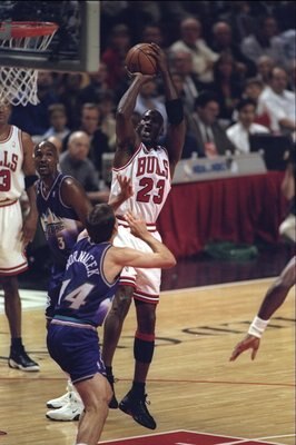 10 Jun 1998:  Michael Jordan #23 of the Chicago Bulls in action against Jeff Hornasek of the Utah Jazz during the NBA Finals Game 4 at the United Center in Chicago, Illinois.  The Bulls defeated the Jazz 86-82. Mandatory Credit: Jonathan Daniel  /Allsport