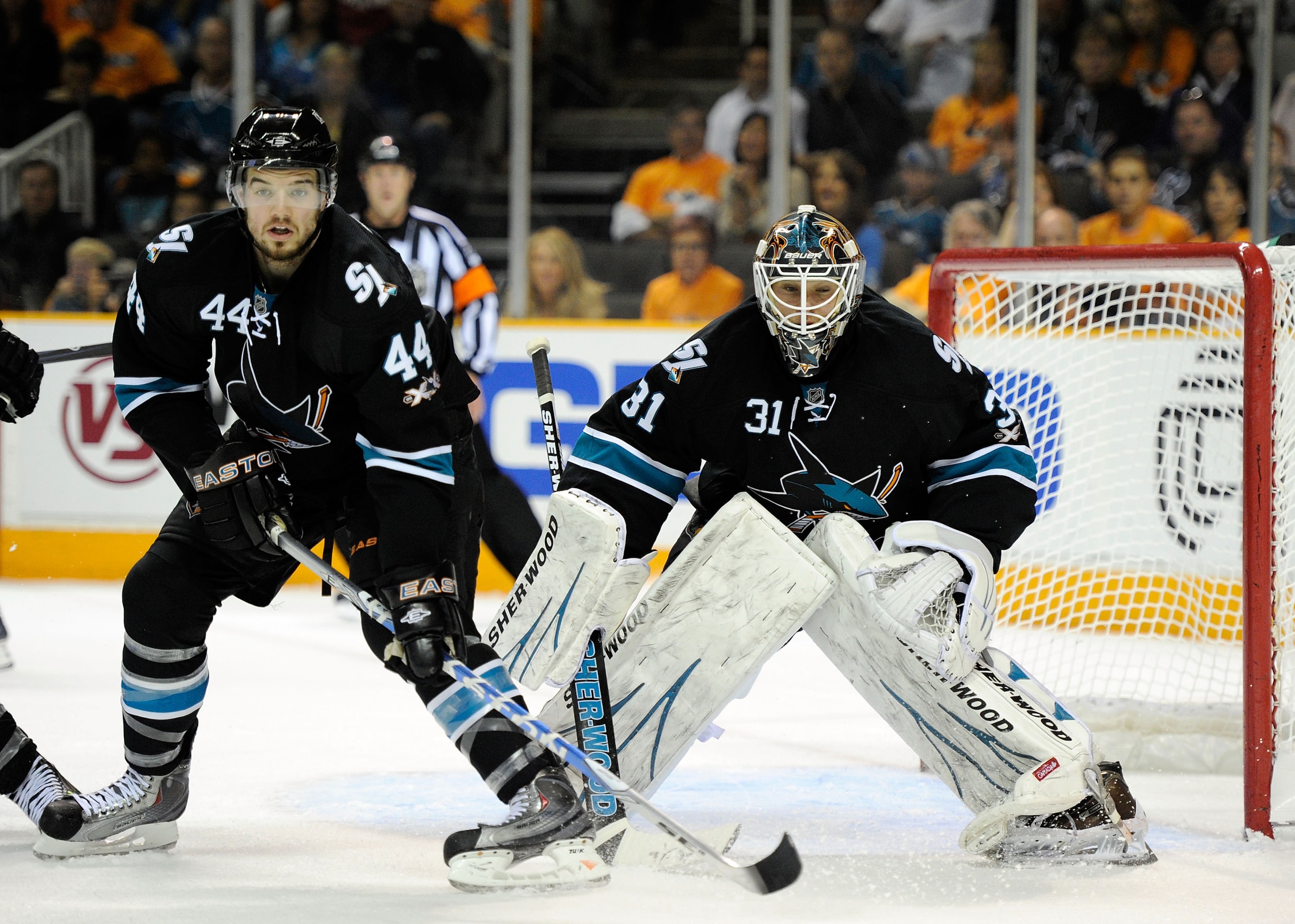 SAN JOSE, CA - MAY 20:  Marc-Edouard Vlasic #44 and Antti Niemi #31 of the San Jose Sharks defend their net in the second period in Game Three of the Western Conference Finals against the Vancouver Canucks during the 2011 Stanley Cup Playoffs at HP Pavili