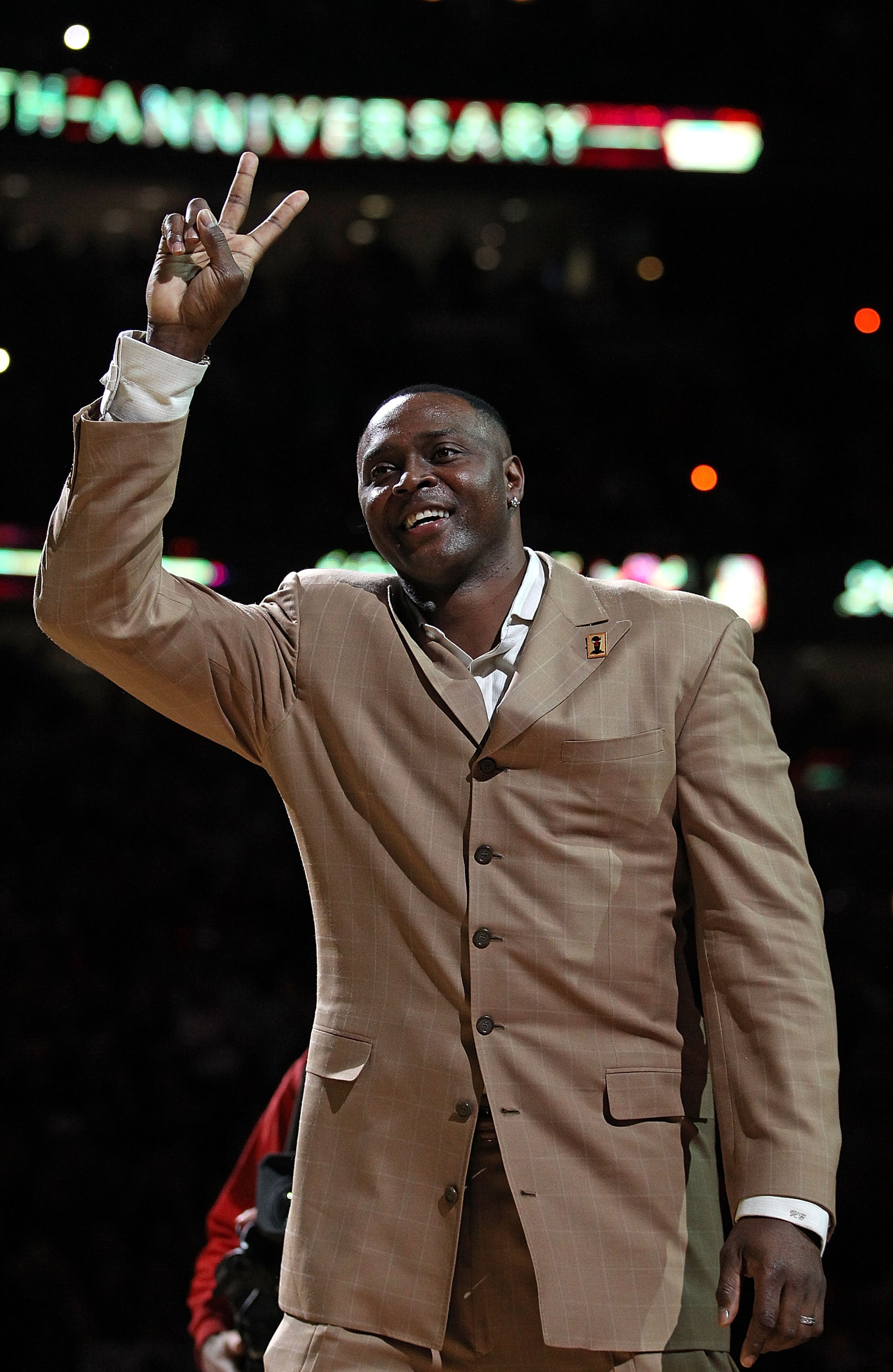 CHICAGO, IL - MARCH 12: Former player Horace Grant of the Chicago Bulls waves to the crowd during a 20th anniversary recognition ceremony of the Bulls 1st NBA Championship in 1991 during half-time of a game bewteen the Bulls and the Utah Jazz at the Unite