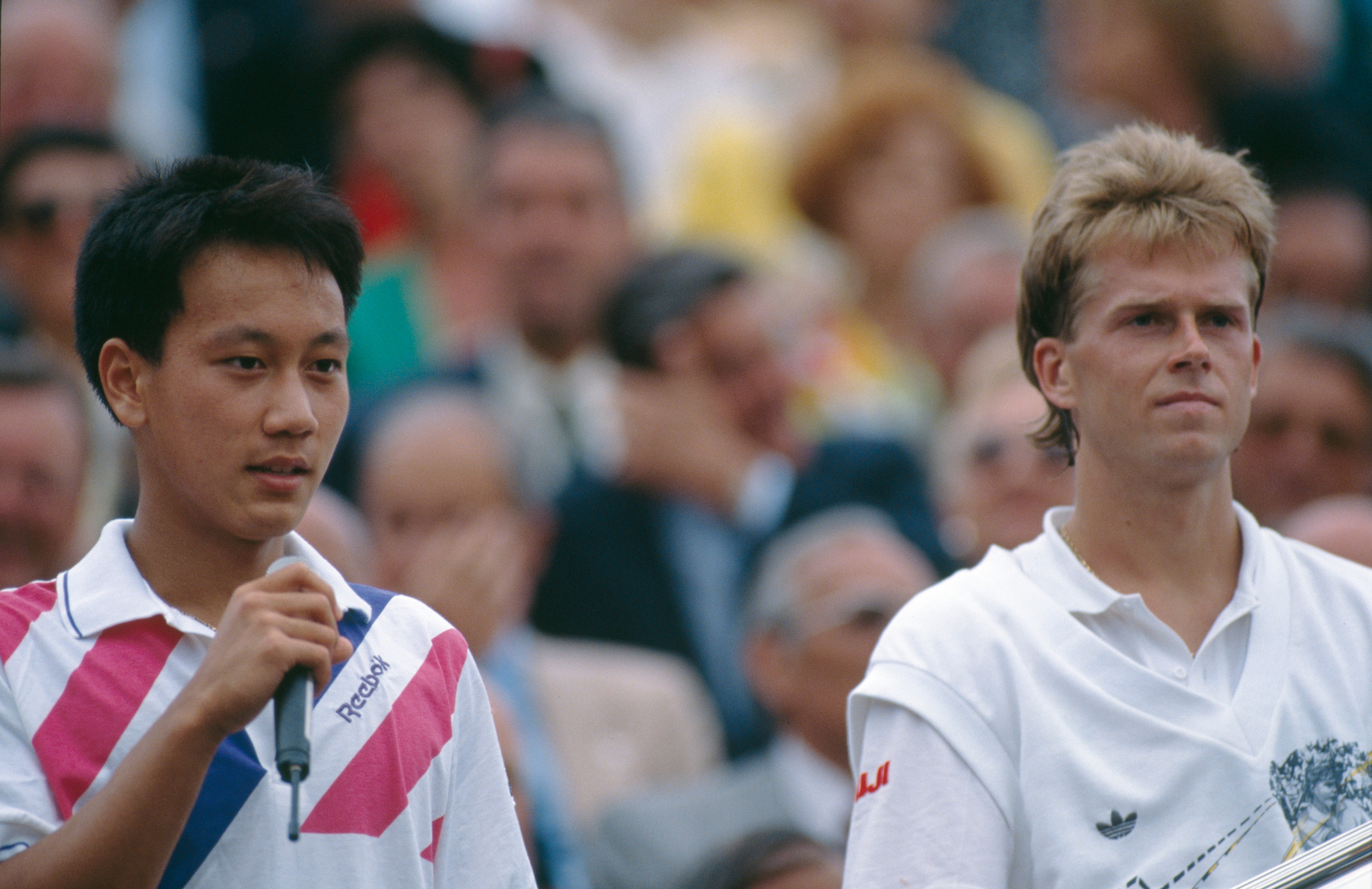 American tennis player Michael Chang (left) with Sweden's Stefan Edberg at the French Open in Paris, 1989. Chang had won the tournament, becoming the youngest male winner of a Grand Slam singles event at the age of 17. (Photo by Simon Bruty/Getty Images) American tennis player Michael Chang (left) with Sweden's Stefan Edberg at the French Open in Paris, 1989. Chang had won the tournament, becoming the youngest male winner of a Grand Slam singles event at the age of 17. (Photo by Simon Bruty/Getty Images)