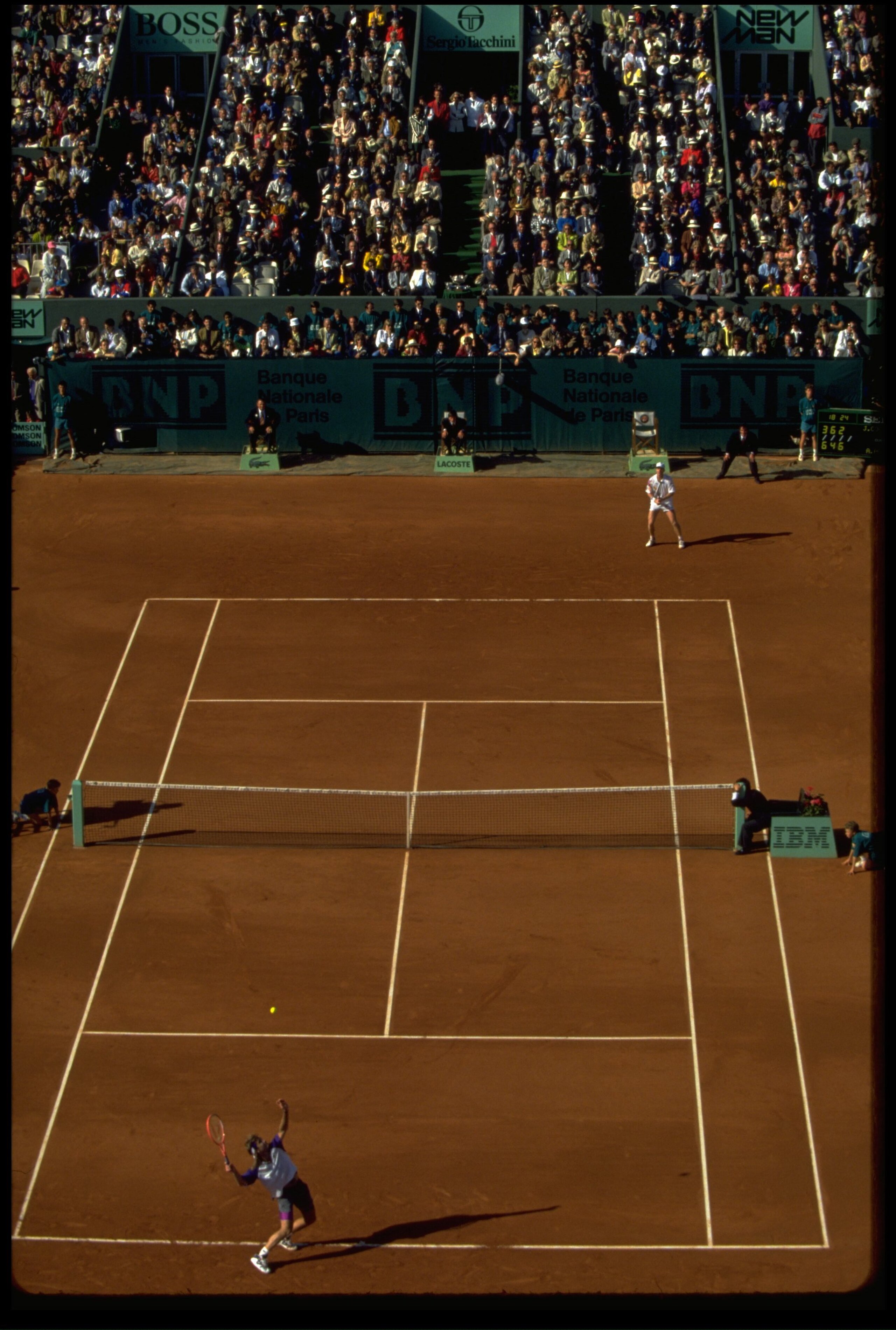 JUN 1991:  ANDRE AGASSI OF THE UNITED STATES TOSSES THE BALL UP FOR A SERVE DURING THE FRENCH OPEN FINAL AGAINST JIM COURIER OF USA AT THE ROLAND GARROS TENNIS CLUB.