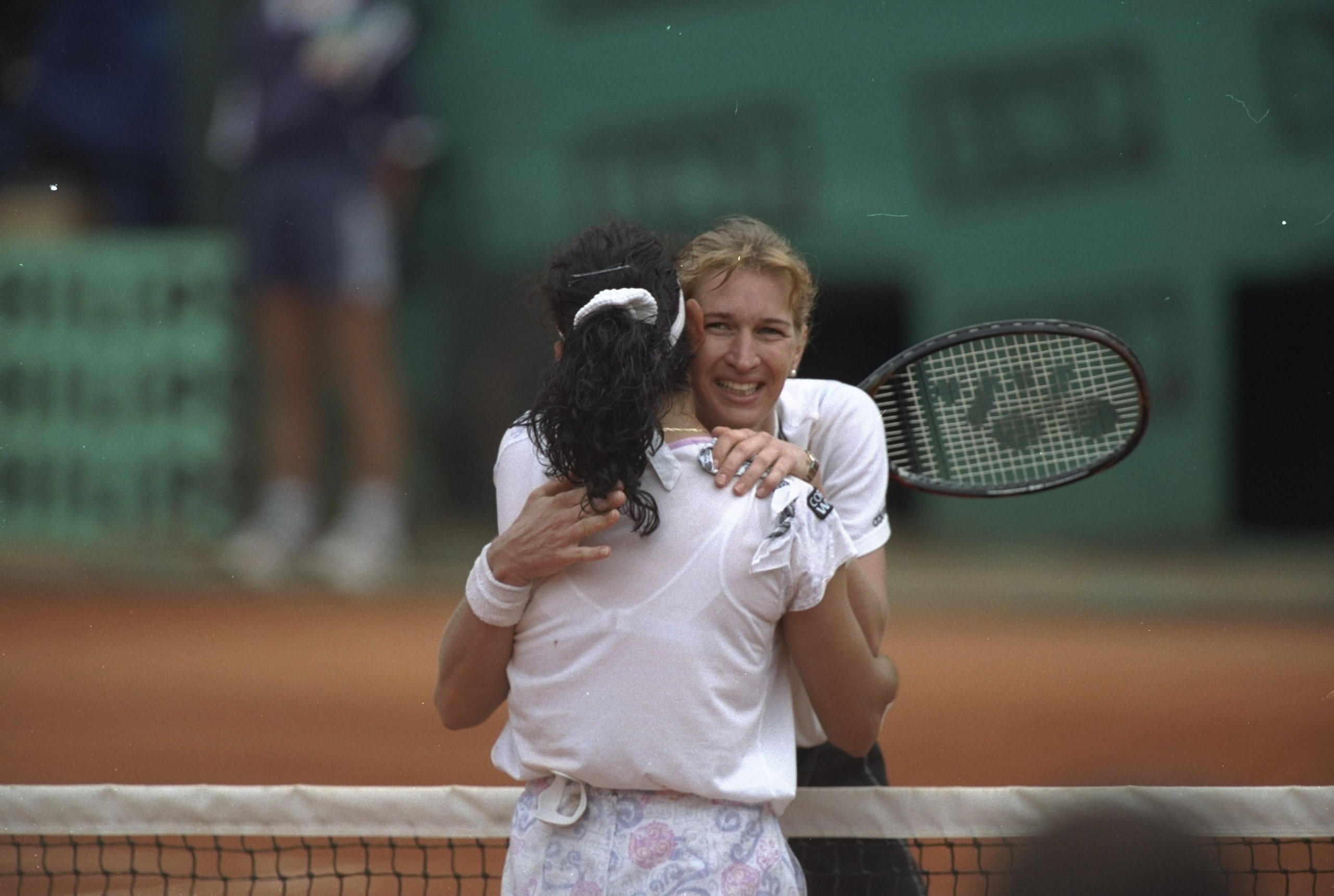Jun 1996:  Steffi Graf of Germany embraces Arantxa Sanchez-Vicario of Spain after Grafs victory in the final of the French Open at Roland Garros Stadium, Paris. \ Mandatory Credit: Clive Brunskill /Allsport