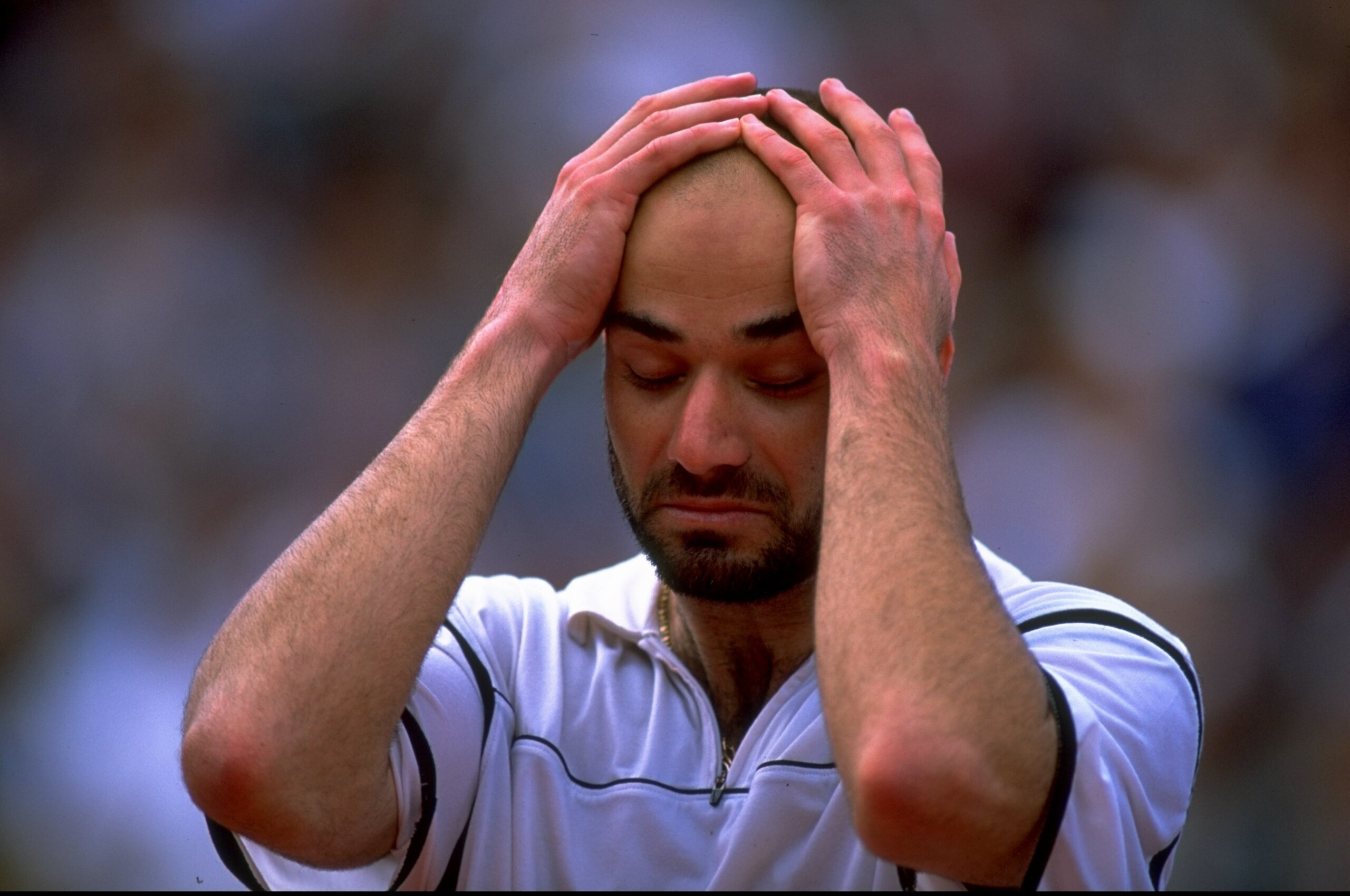 6 Jun 1999:  Andre Agassi of the United States celebrates victory and is overcome with emotions during the 1999 French Open Final match against Andrei Medvedev of the Ukraine played at Roland Garros in Paris, France.  The match finished in an emotional vi