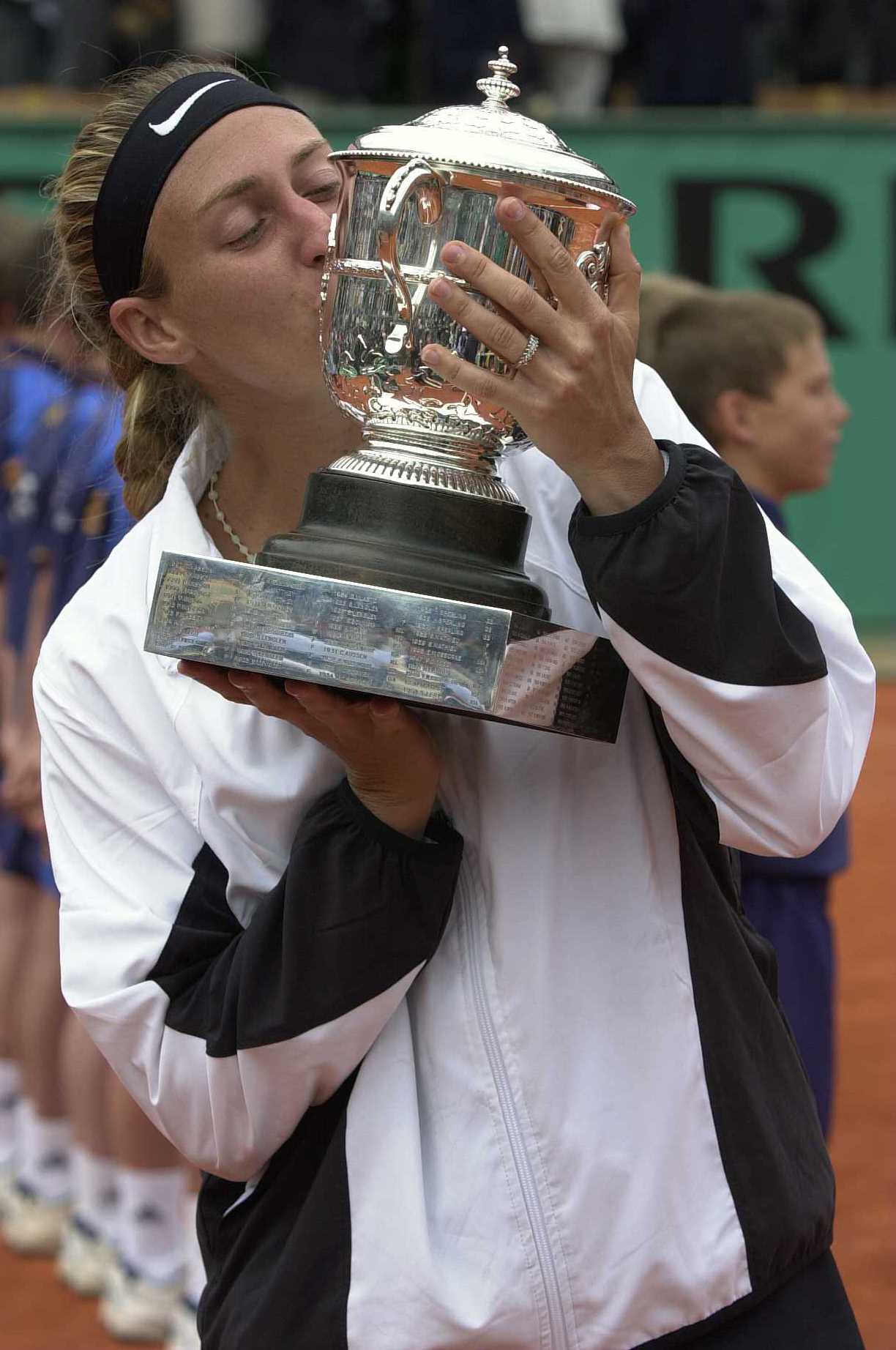 10 June 2000: Mary Pierce of France kisses the trophy after her straight sets victory over Conchita Martinez of Spain in the Final of the Womens singles at the French Open, Roland Garros, Paris, France. Mandatory Credit: Clive Brunskill/ALLSPORT 10 June 2000: Mary Pierce of France kisses the trophy after her straight sets victory over Conchita Martinez of Spain in the Final of the Womens singles at the French Open, Roland Garros, Paris, France. Mandatory Credit: Clive Brunskill/ALLSPORT