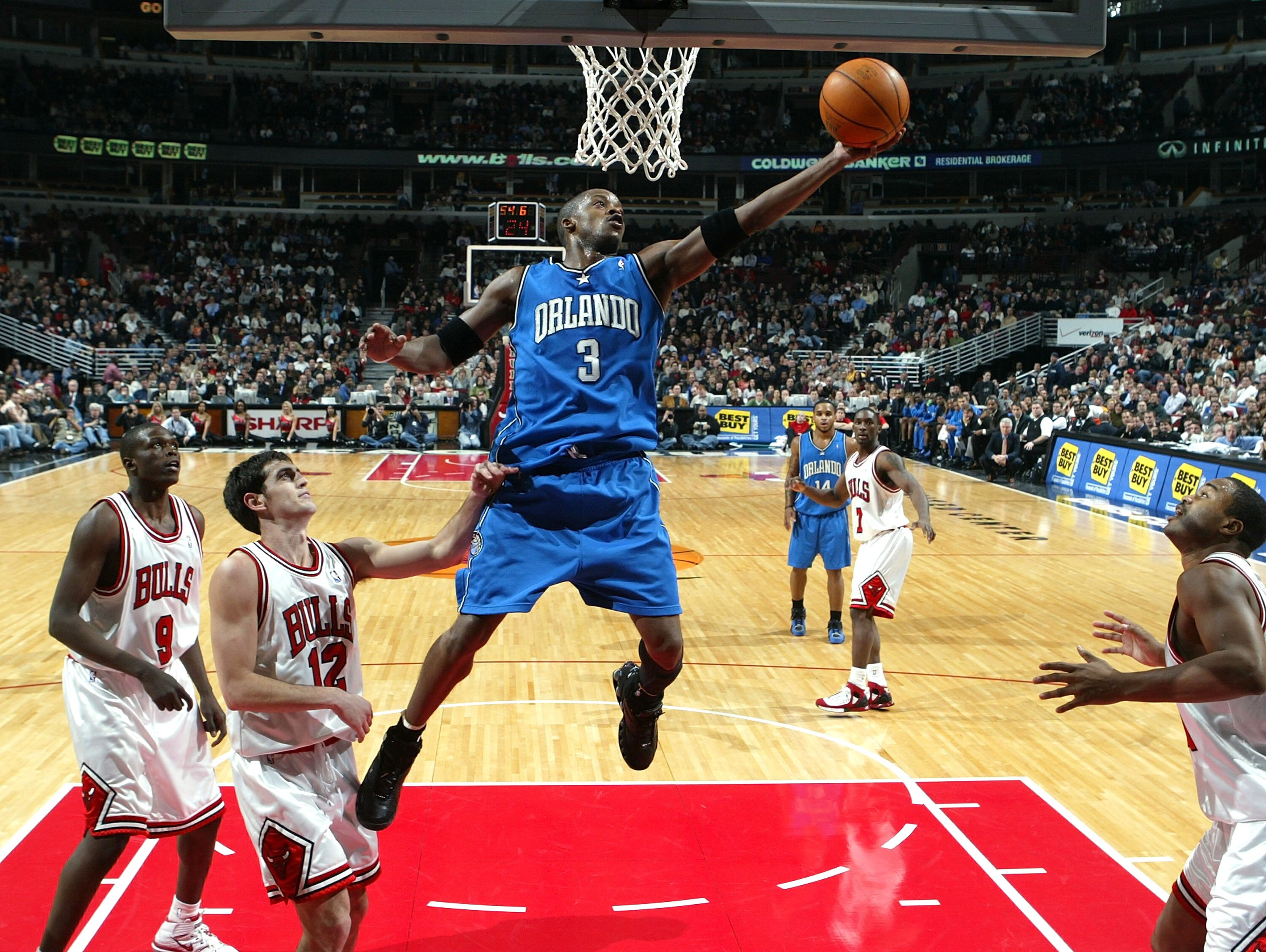 CHICAGO - NOVEMBER 29:  Steve Francis #3 of the Orlando Magic puts up a shot over (from L) Luol Deng #9, Kirk Hinrich #12 and Othella Harrington #24 of the Chicago Bulls on November 29, 2005 at the United Center in Chicago, Illinois.  NOTE TO USER: User e