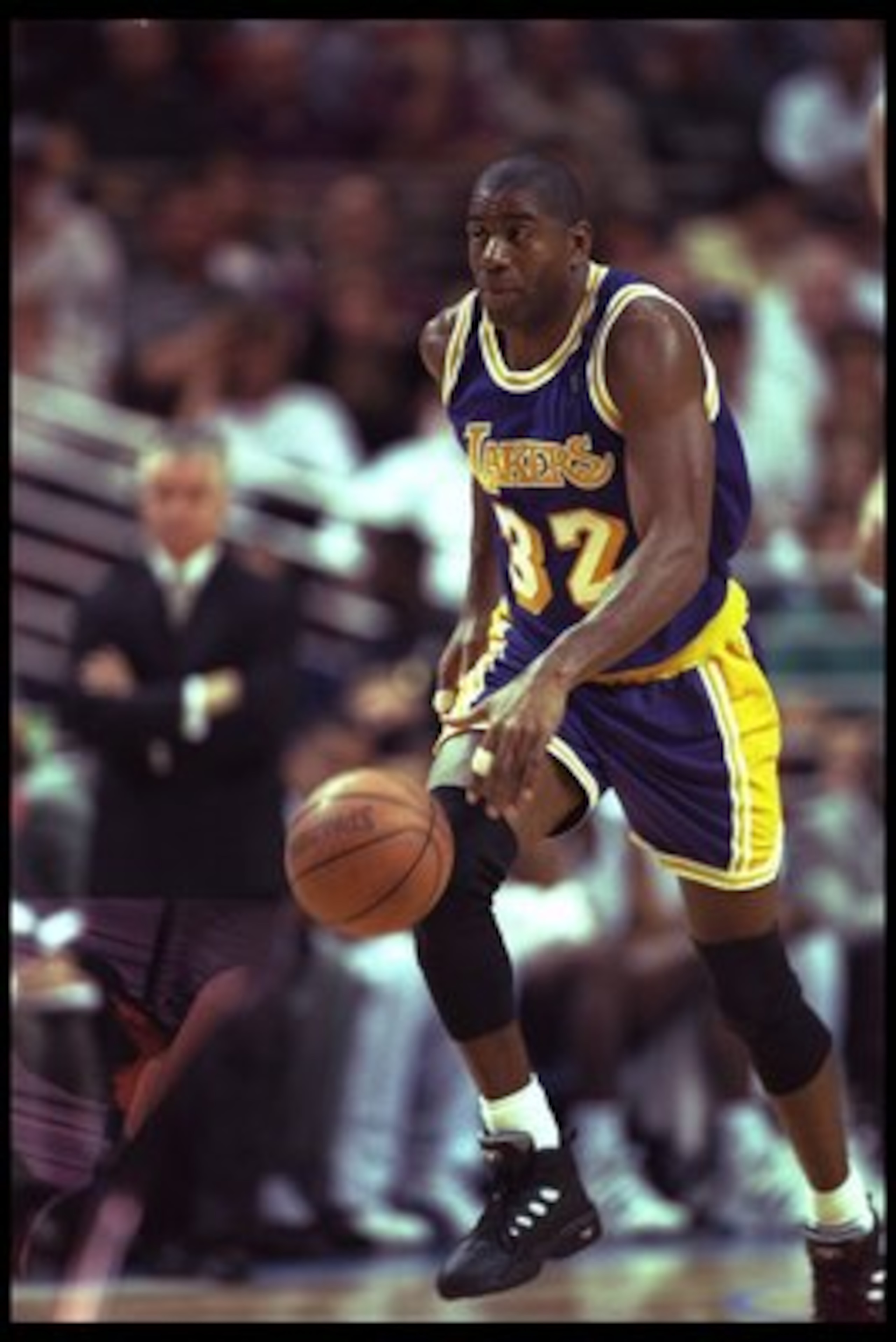 26 Mar 1996:  Guard Magic Johnson of the Los Angeles Lakers moves the ball against the Orlando Magic during a game played at the Orlando Arena in Orlando, Florida.  The Lakers won the game, 113-91. Mandatory Credit: ALLSPORT USA  /Allsport
