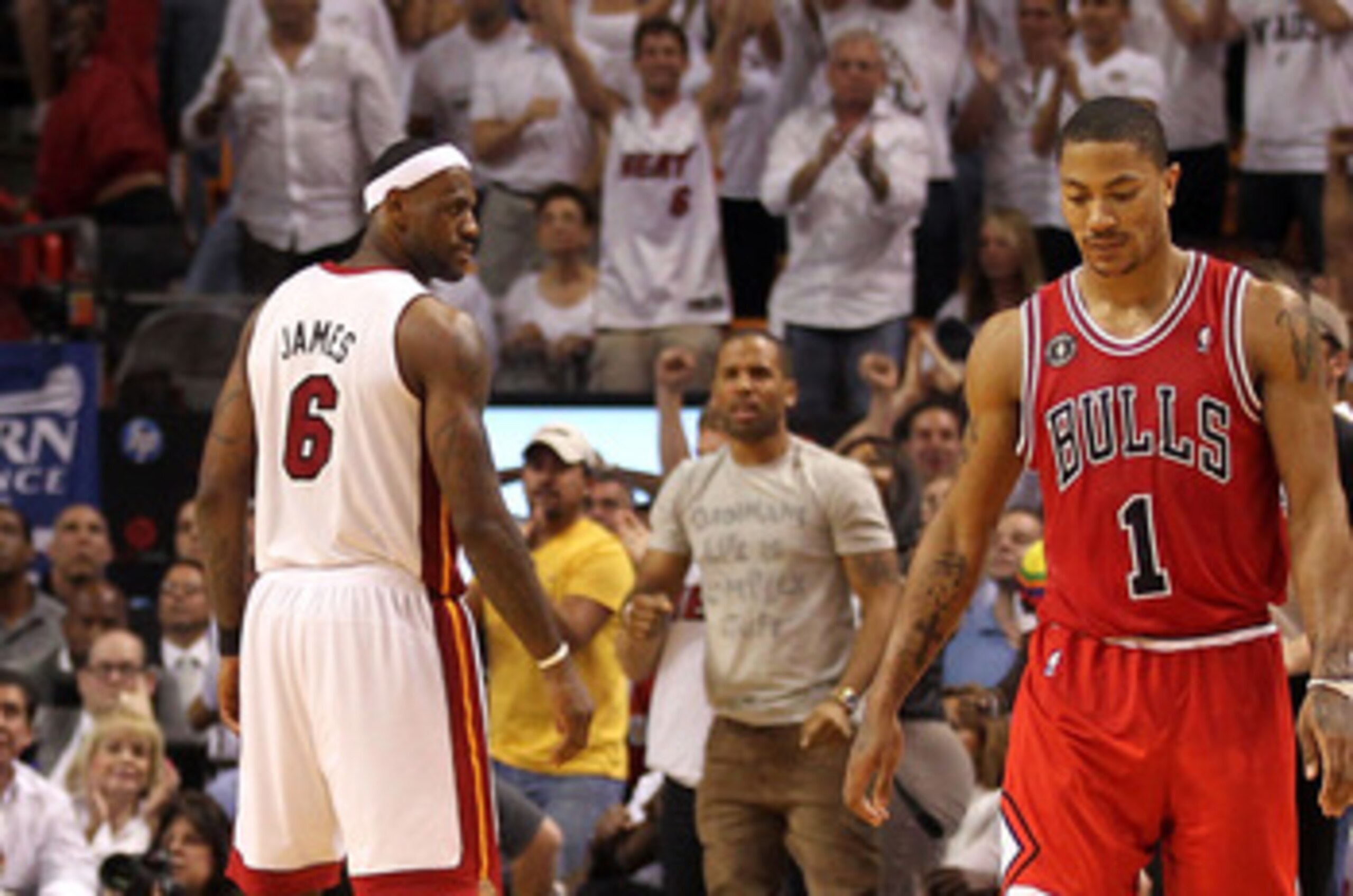 MIAMI, FL - MAY 24: Derrick Rose #1 of the Chicago Bulls walks up court as LeBron James #6 (C) and Dwyane Wade #3 of the Miami Heat look on in Game Four of the Eastern Conference Finals during the 2011 NBA Playoffs on May 24, 2011 at American Airlines Are
