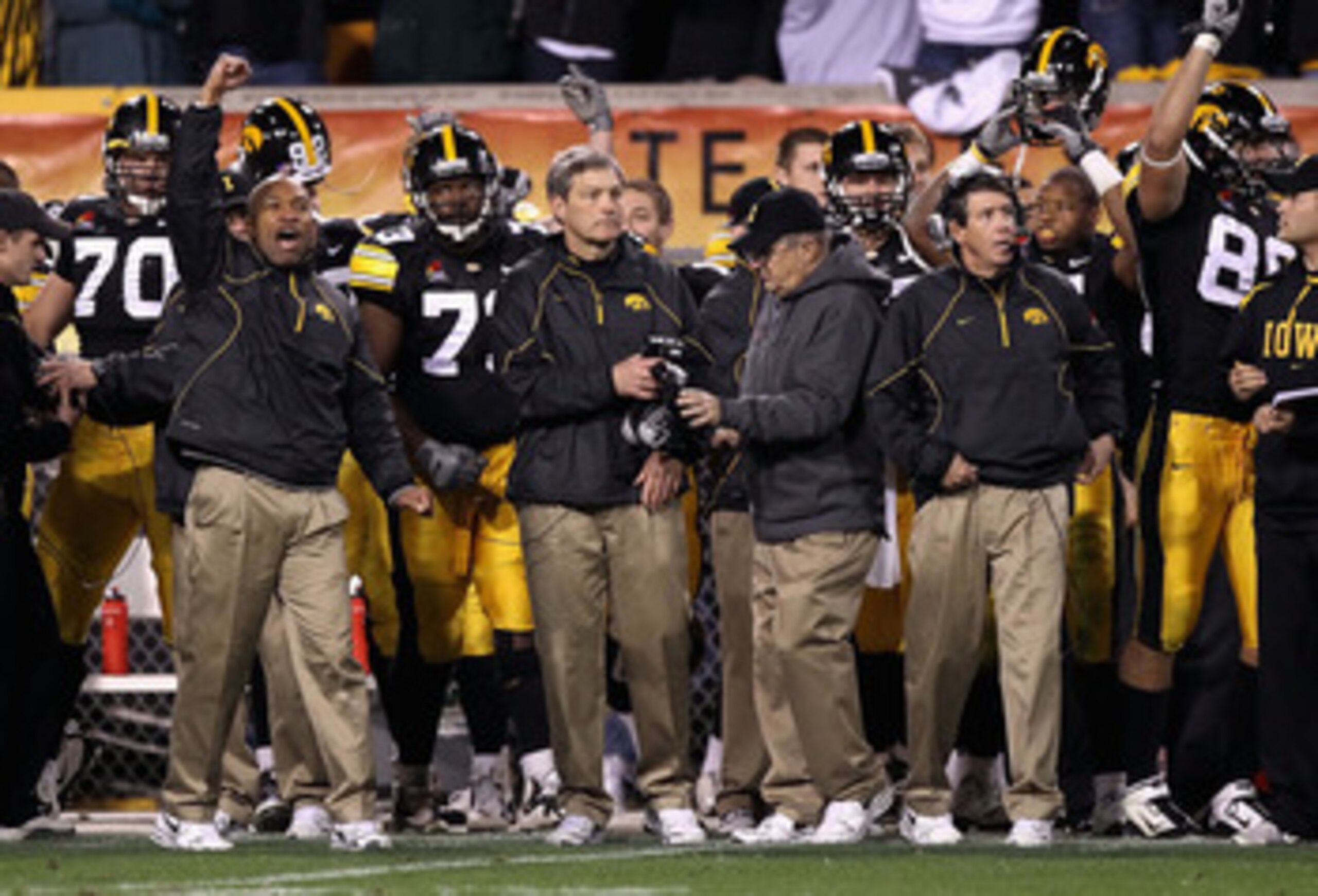 TEMPE, AZ - DECEMBER 28: Head coach Kirk Ferentz (C) of the Iowa Hawkeyes celebrates with teammates after defeating the Missouri Tigers in the Insight Bowl at Sun Devil Stadium on December 28, 2010 in Tempe, Arizona. The Hawkeyes defeated the Tigers 27- TEMPE, AZ - DECEMBER 28: Head coach Kirk Ferentz (C) of the Iowa Hawkeyes celebrates with teammates after defeating the Missouri Tigers in the Insight Bowl at Sun Devil Stadium on December 28, 2010 in Tempe, Arizona. The Hawkeyes defeated the Tigers 27-