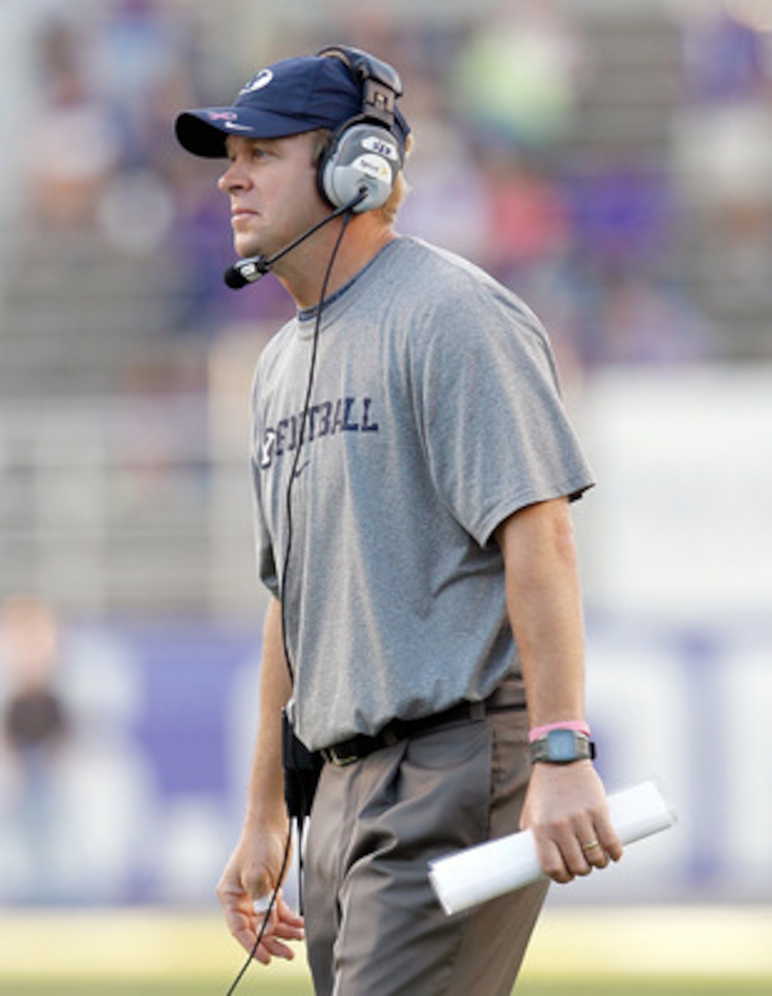 FORT WORTH, TX - OCTOBER 16: Head coach Bronco Mendenhall of the BYU Cougars heads his team against the TCU Horned Frogs at Amon G. Carter Stadium on October 16, 2010 in Fort Worth, Texas. TCU beat BYU 31-3. (Photo by Tom Pennington/Getty Images) FORT WORTH, TX - OCTOBER 16: Head coach Bronco Mendenhall of the BYU Cougars heads his team against the TCU Horned Frogs at Amon G. Carter Stadium on October 16, 2010 in Fort Worth, Texas. TCU beat BYU 31-3. (Photo by Tom Pennington/Getty Images)