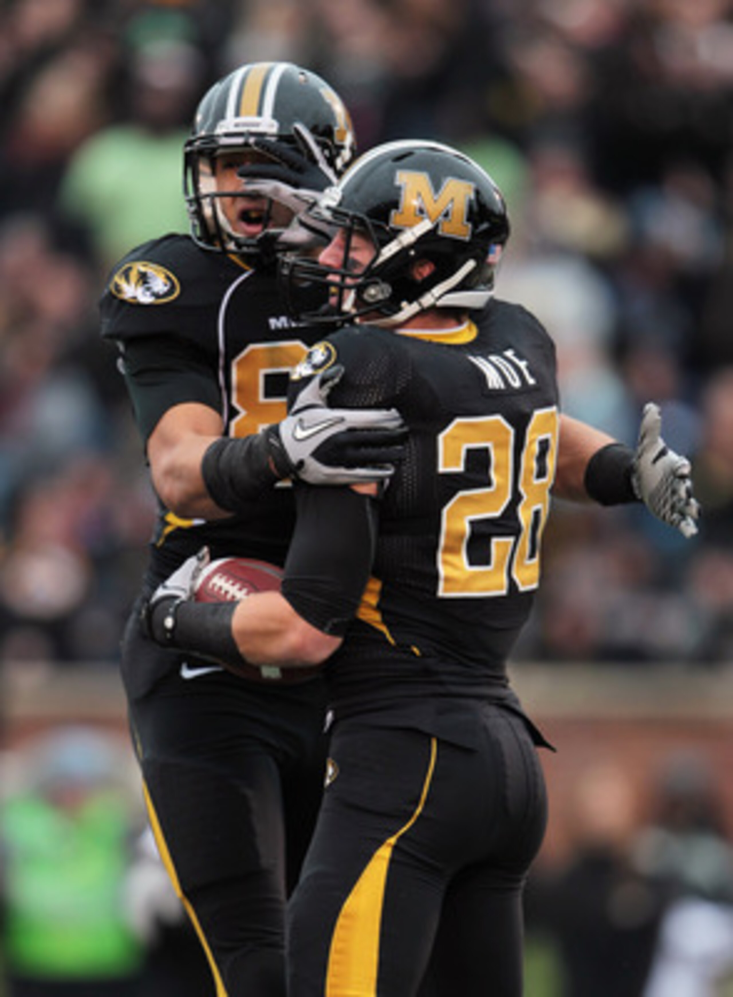 COLUMBIA, MO - NOVEMBER 13: Michael Egnew #82 of the Missouri Tigers congratulates T.J.Moe #28 with a chest bump after Moe scored a touchdown during the game against the Kansas State Wildcats on November 13, 2010 at Faurot Field/Memorial Stadium in Colu COLUMBIA, MO - NOVEMBER 13: Michael Egnew #82 of the Missouri Tigers congratulates T.J.Moe #28 with a chest bump after Moe scored a touchdown during the game against the Kansas State Wildcats on November 13, 2010 at Faurot Field/Memorial Stadium in Colu
