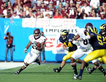 JACKSONVILLE, FL - JANUARY 01:  Running back Vick Ballard #28 of the Mississippi State Bulldogs rushes against the Michigan Wolverines during the Gator Bowl at EverBank Field on January 1, 2011 in Jacksonville, Florida  (Photo by Rick Dole/Getty Images)