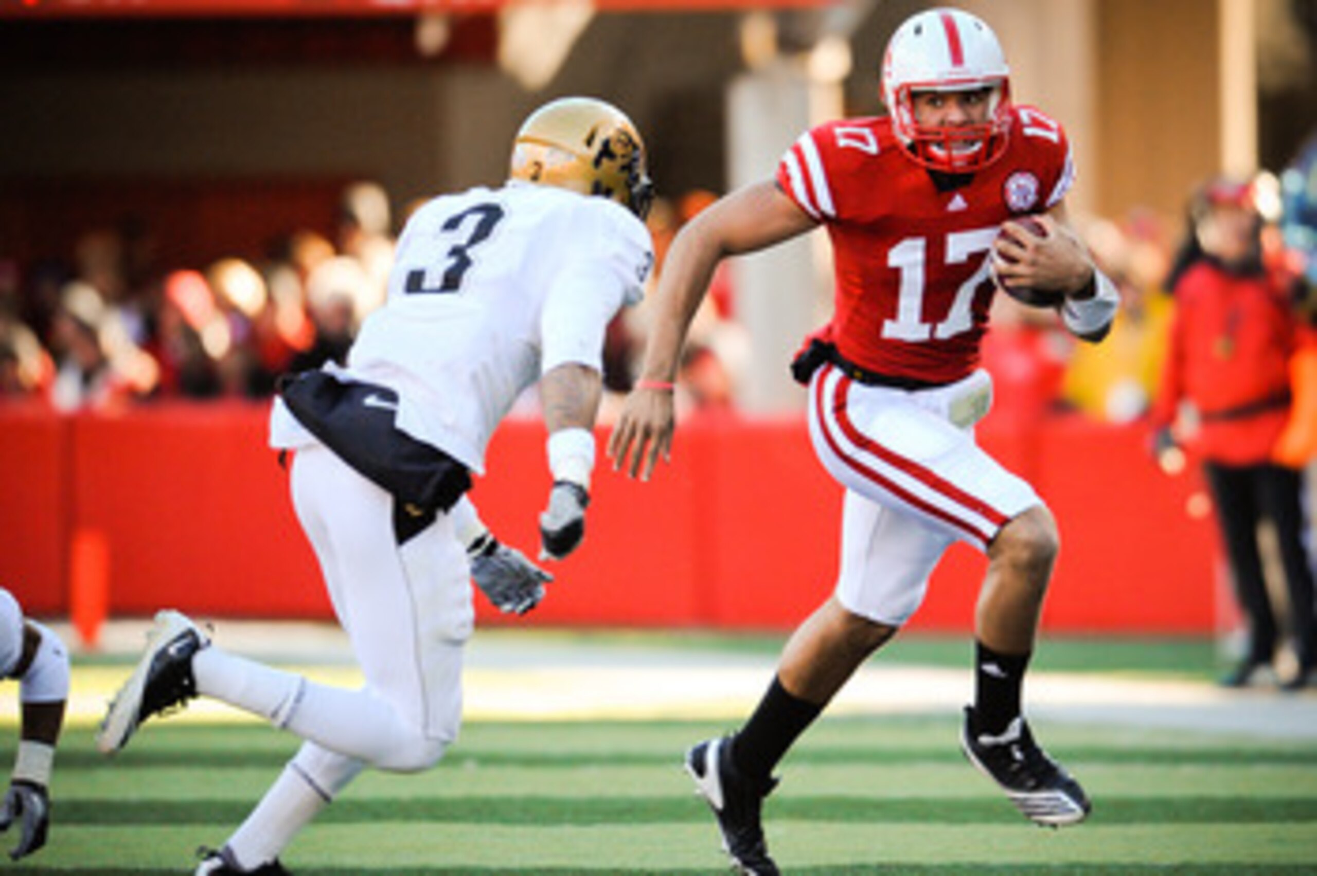 LINCOLN, NE - NOVEMBER 26: Cody Green #17 of the Nebraska Cornhuskers slips past Jimmy Smith #3 of the Colorado Buffaloes during their game at Memorial Stadium on November 26, 2010 in Lincoln, Nebraska. Nebraska defeated Colorado 45-17 (Photo by Eric Fran LINCOLN, NE - NOVEMBER 26: Cody Green #17 of the Nebraska Cornhuskers slips past Jimmy Smith #3 of the Colorado Buffaloes during their game at Memorial Stadium on November 26, 2010 in Lincoln, Nebraska. Nebraska defeated Colorado 45-17 (Photo by Eric Fran