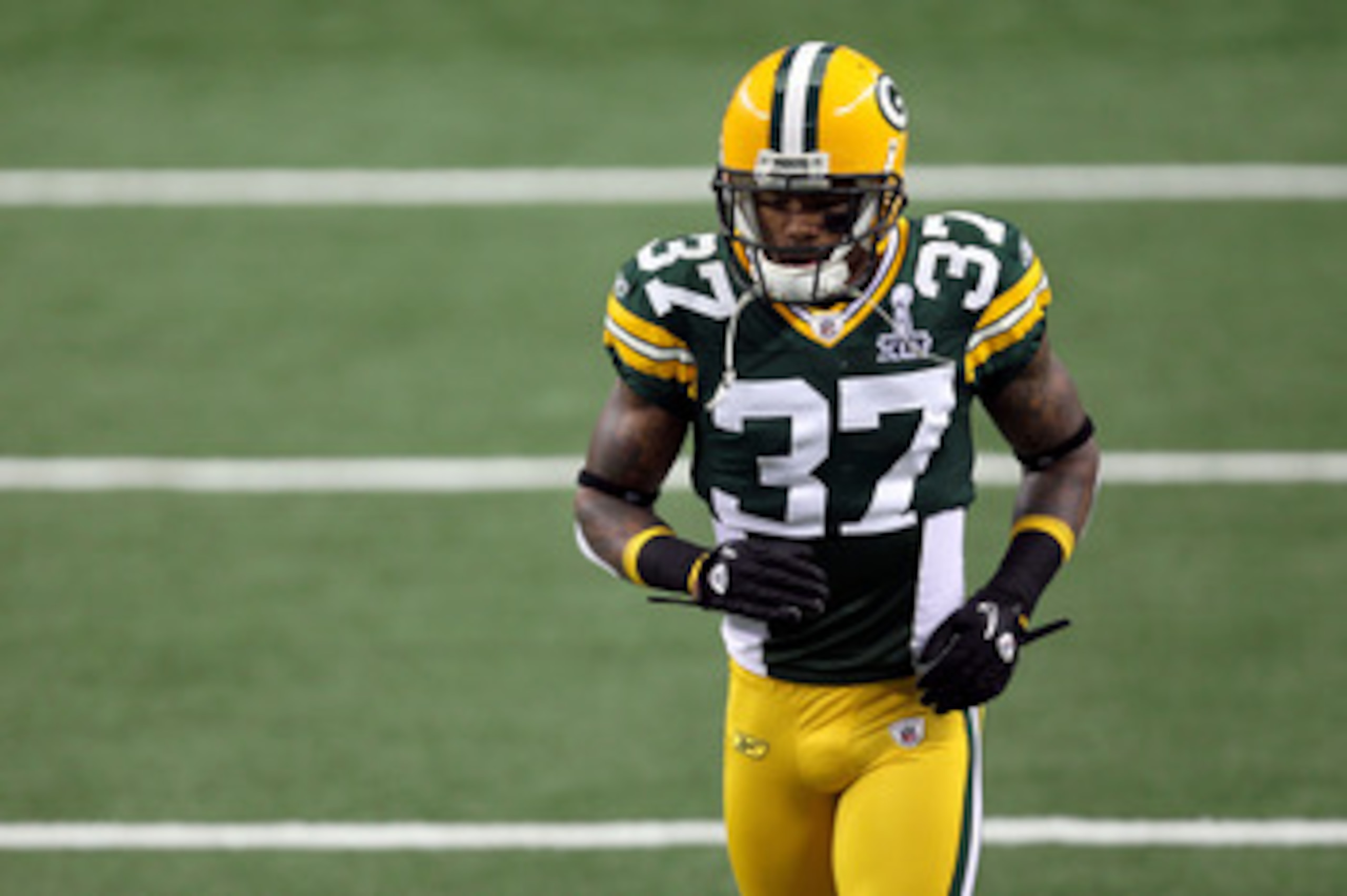 ARLINGTON, TX - FEBRUARY 06:  Sam Shields #37 of the Green Bay Packers runs on the field during warm ups against the Pittsburgh Steelers during Super Bowl XLV at Cowboys Stadium on February 6, 2011 in Arlington, Texas. The {ackers won 31-25. (Photo by Mik