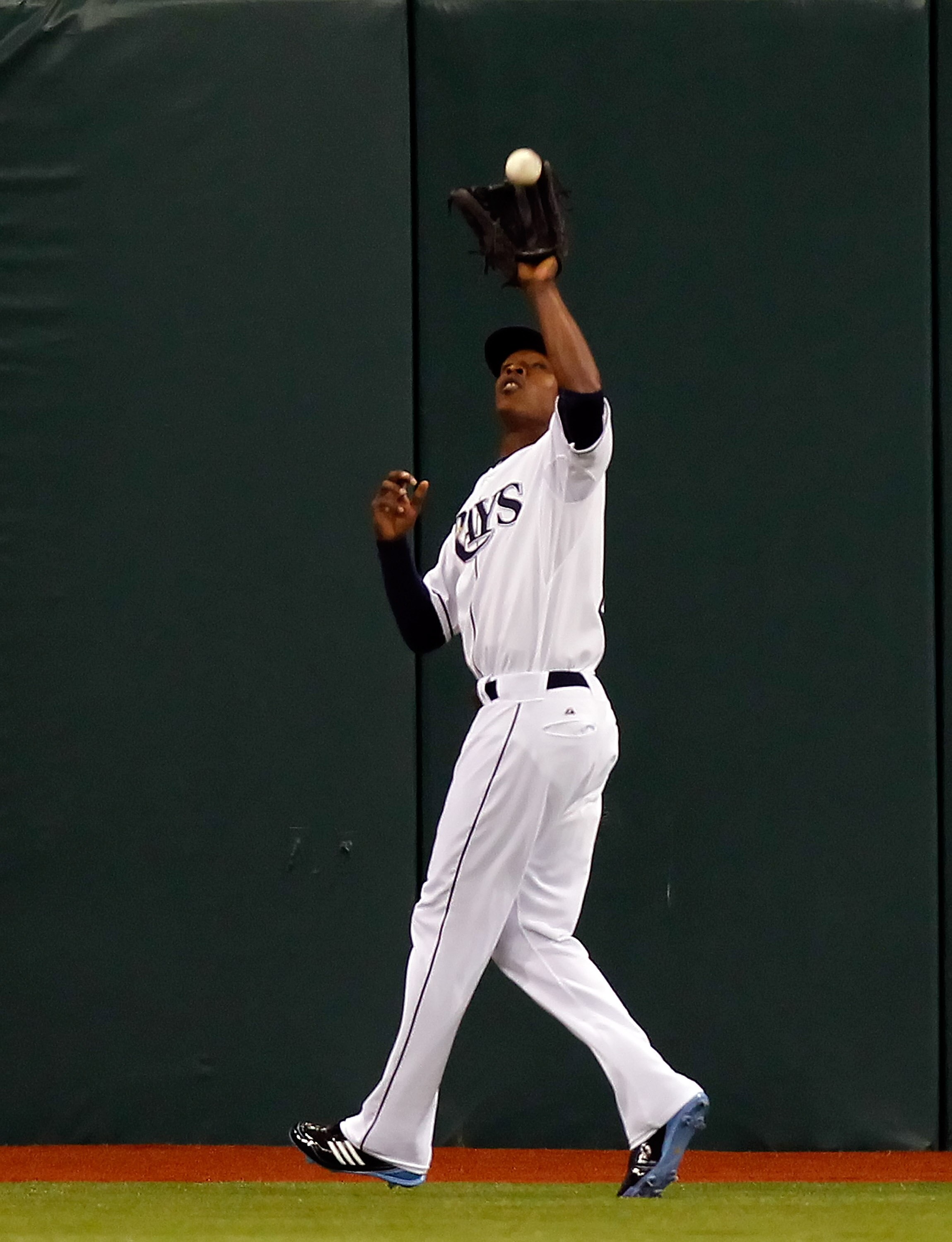 ST. PETERSBURG, FL - MAY 14:  Outfielder B.J. Upton #2 of the Tampa Bay Rays catches a fly ball against the Baltimore Orioles during the game at Tropicana Field on May 14, 2011 in St. Petersburg, Florida.  (Photo by J. Meric/Getty Images)