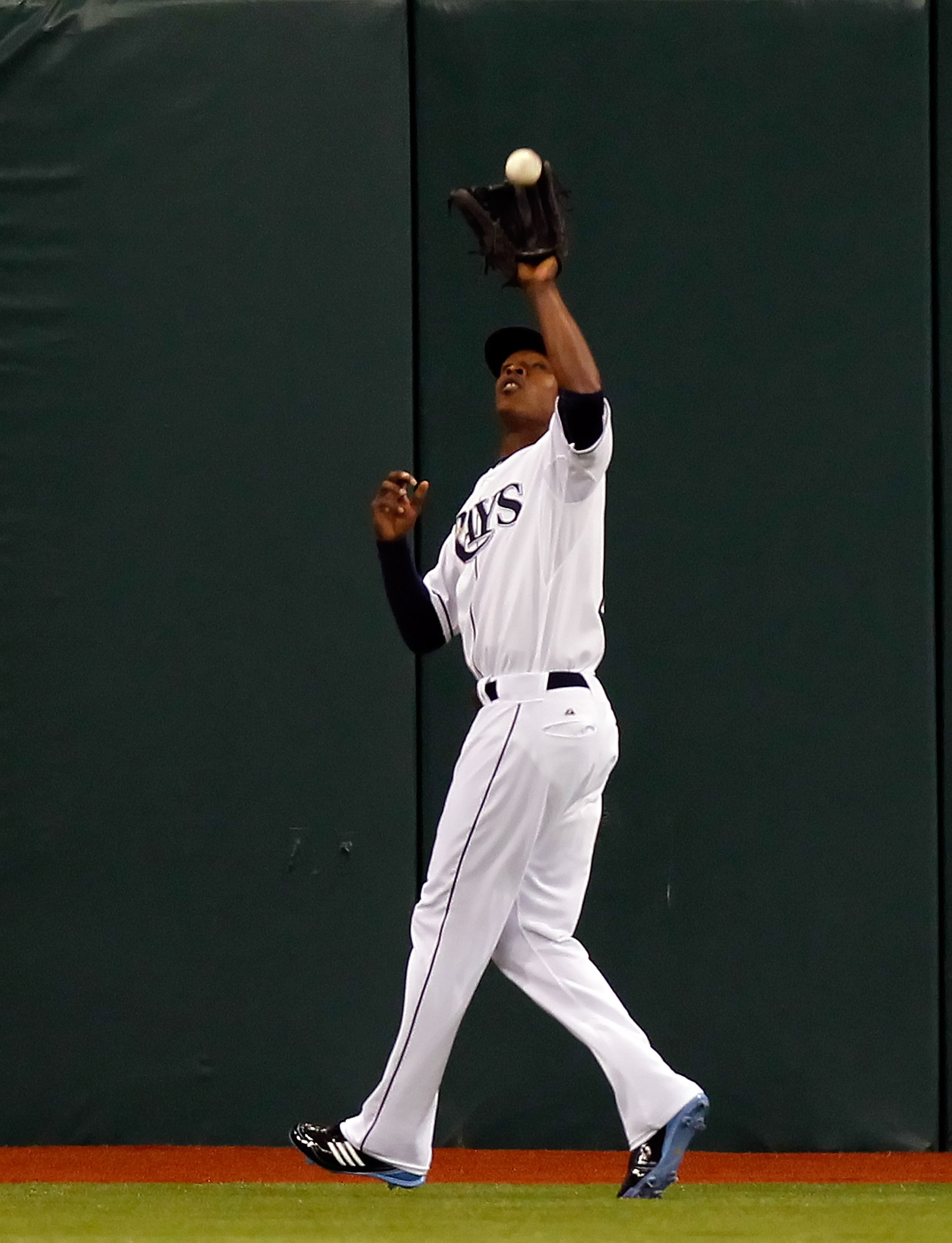ST. PETERSBURG, FL - MAY 14:  Outfielder B.J. Upton #2 of the Tampa Bay Rays catches a fly ball against the Baltimore Orioles during the game at Tropicana Field on May 14, 2011 in St. Petersburg, Florida.  (Photo by J. Meric/Getty Images)