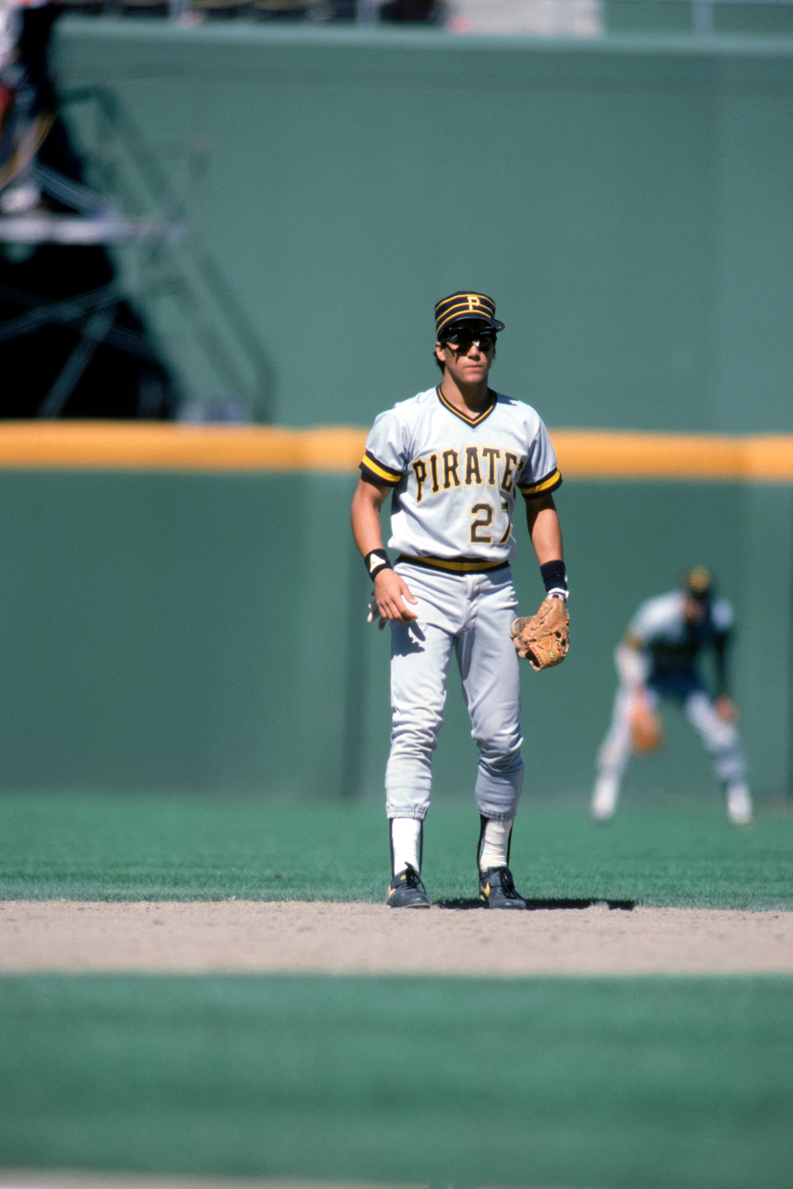 SAN DIEGO - UNDATED:  Sam Khalifa #27 of the Pittsburgh Pirates stands ready for a play during a game against the San Diego Padres circa 1985-1987 at Jack Murphy Stadium in San Diego, California.  (Photo by Rick Stewart/Getty Images)