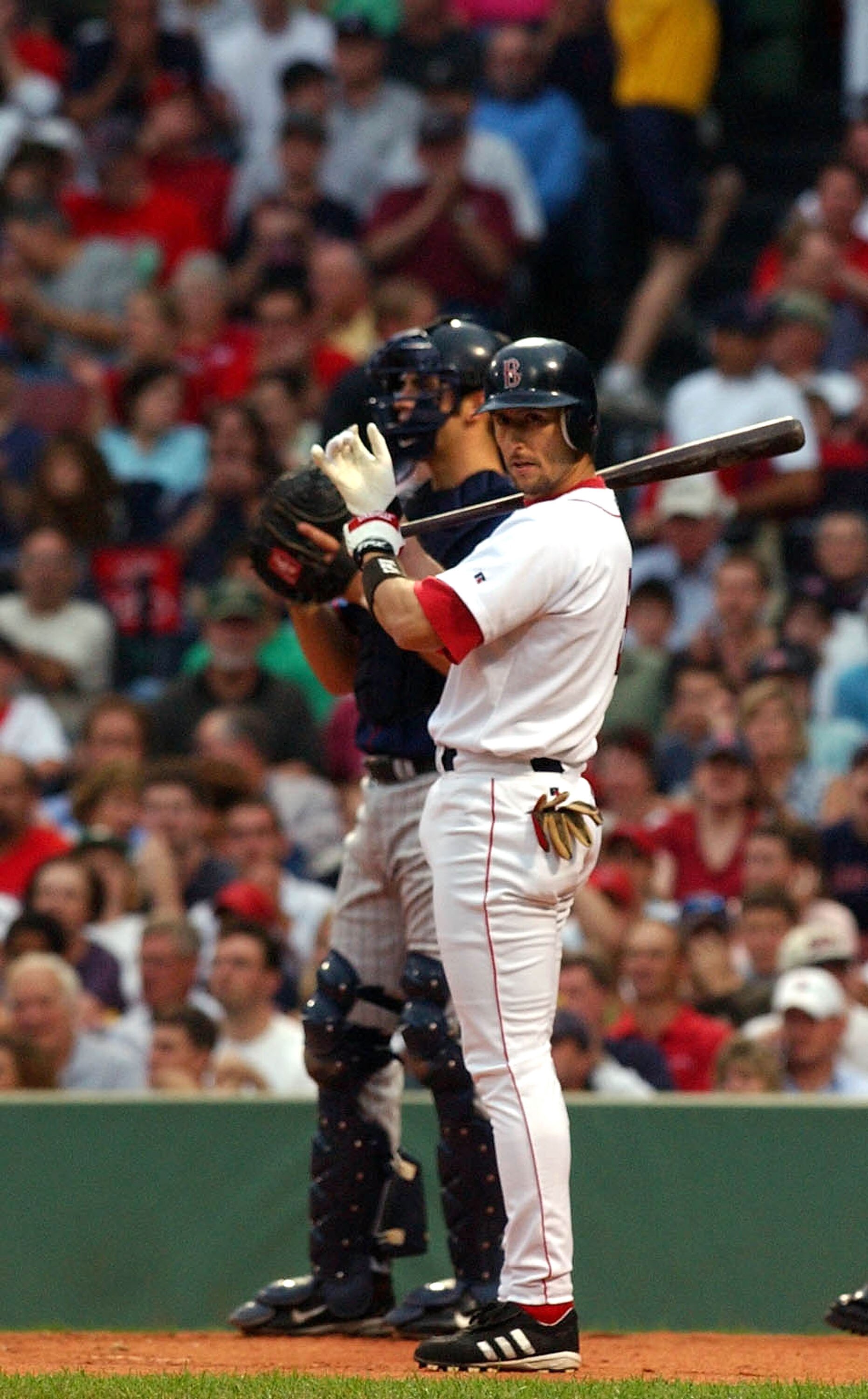 BOSTON - JUNE 22:  Nomar Garciaparra #5 of the Boston Red Sox prepares to bat during the first inning against the Minnesota Twins June 22, 2004 at Fenway Park in Boston, Massachusetts.  (Photo by Darren McCollester/Getty Images)