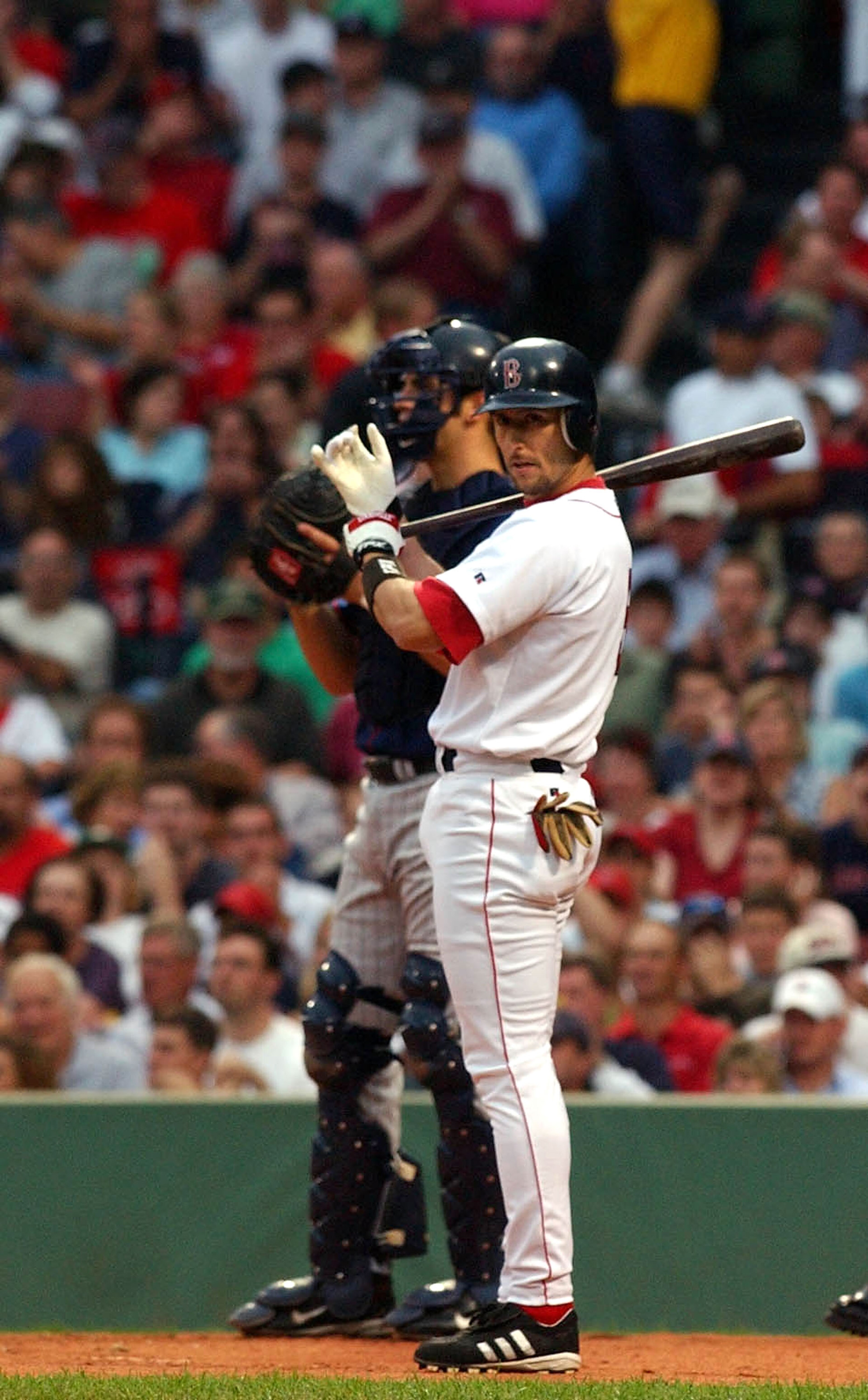 BOSTON - JUNE 22:  Nomar Garciaparra #5 of the Boston Red Sox prepares to bat during the first inning against the Minnesota Twins June 22, 2004 at Fenway Park in Boston, Massachusetts.  (Photo by Darren McCollester/Getty Images)