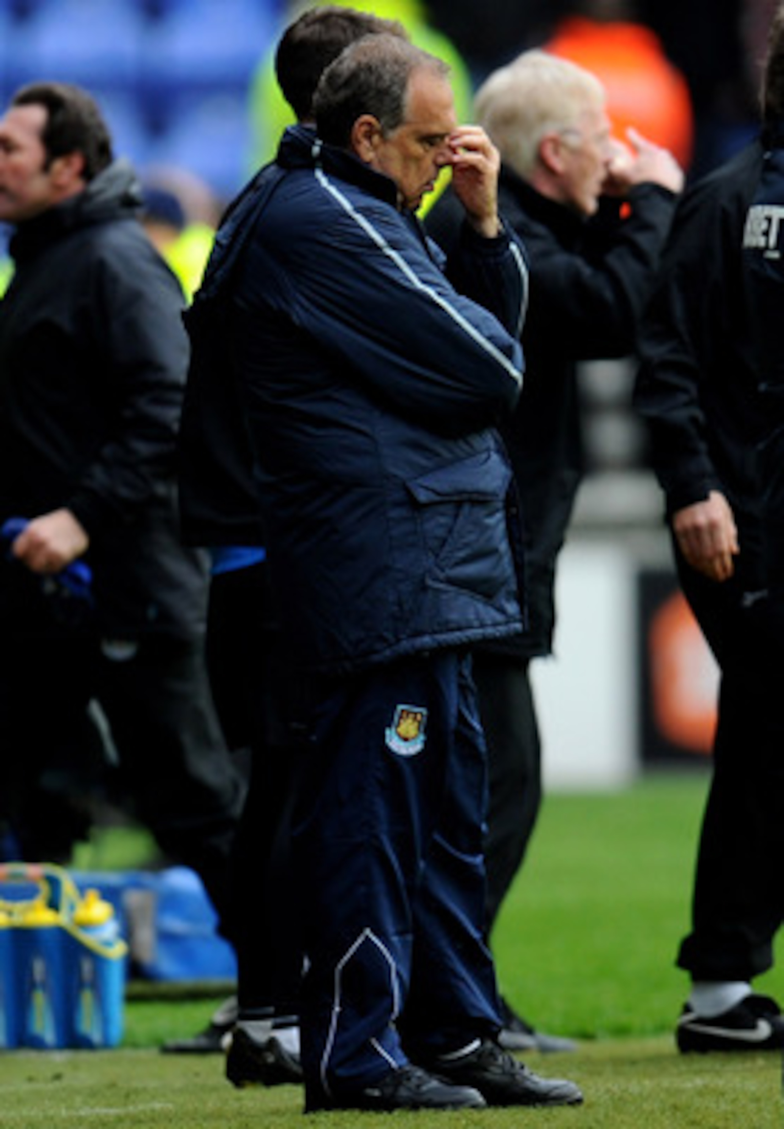 WIGAN, ENGLAND - MAY 15:  West Ham United Manager Avram Grant looks dejected during the Barclays Premier League match between Wigan Athletic and West Ham United at the DW Stadium on May 15, 2011 in Wigan, England.  (Photo by Clive Mason/Getty Images)