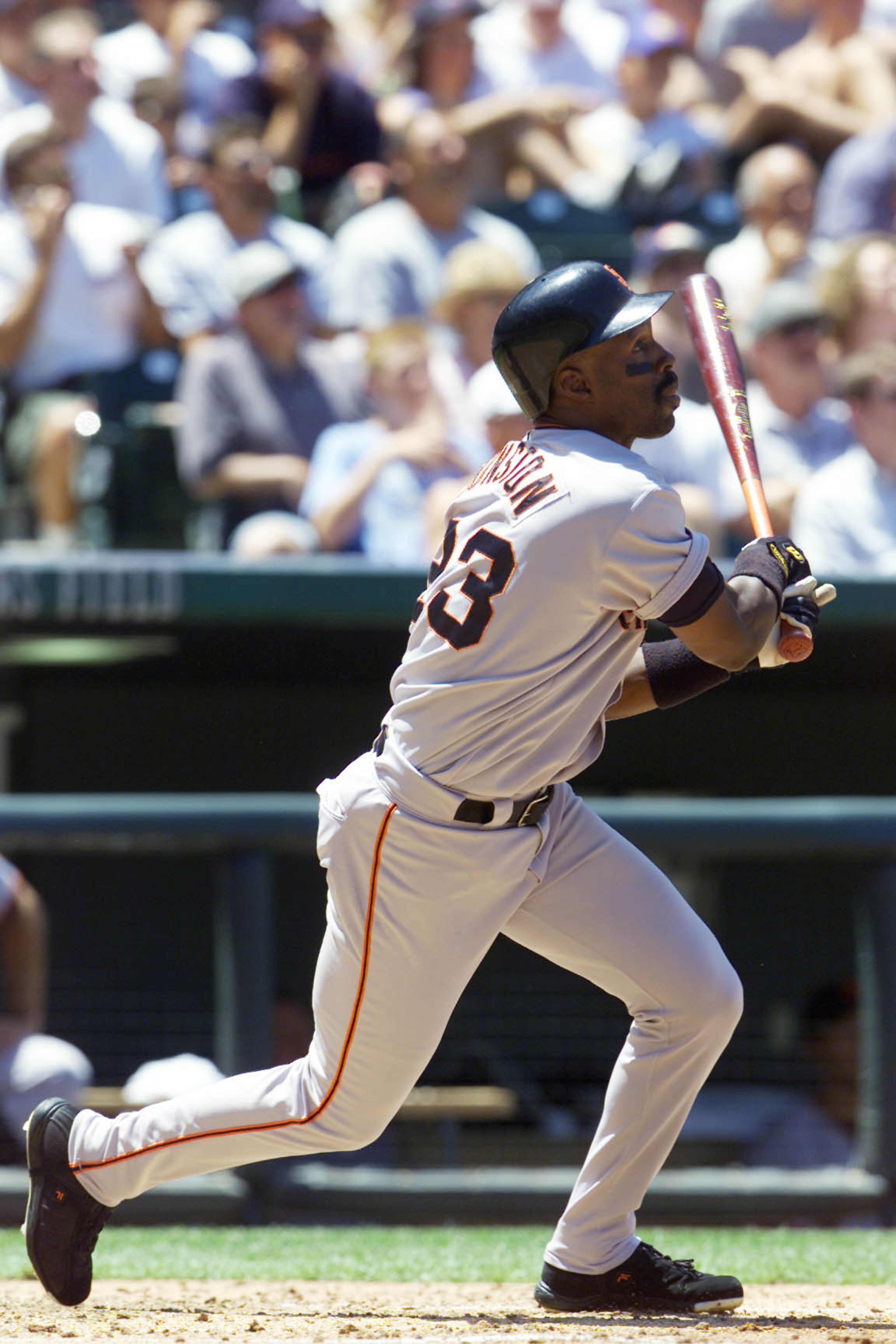 25 Jul 2001: Shawon Dunston hits against the Colorado Rockies at Coors Field in Denver, Colorado. DIGITAL IMAGE. Mandatory Credit: Brian Bahr/Allsport