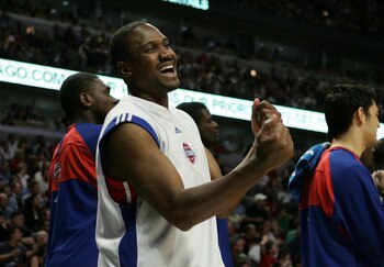 CHICAGO - MAY 10:  Lindsey Hunter #10 of the Detroit Pistons celebrates late in the game on the bench against the Chicago Bulls in Game Three of the Eastern Conference Semifinals during the 2007 NBA Playoffs at the United Center Center on May 10, 2007 in 