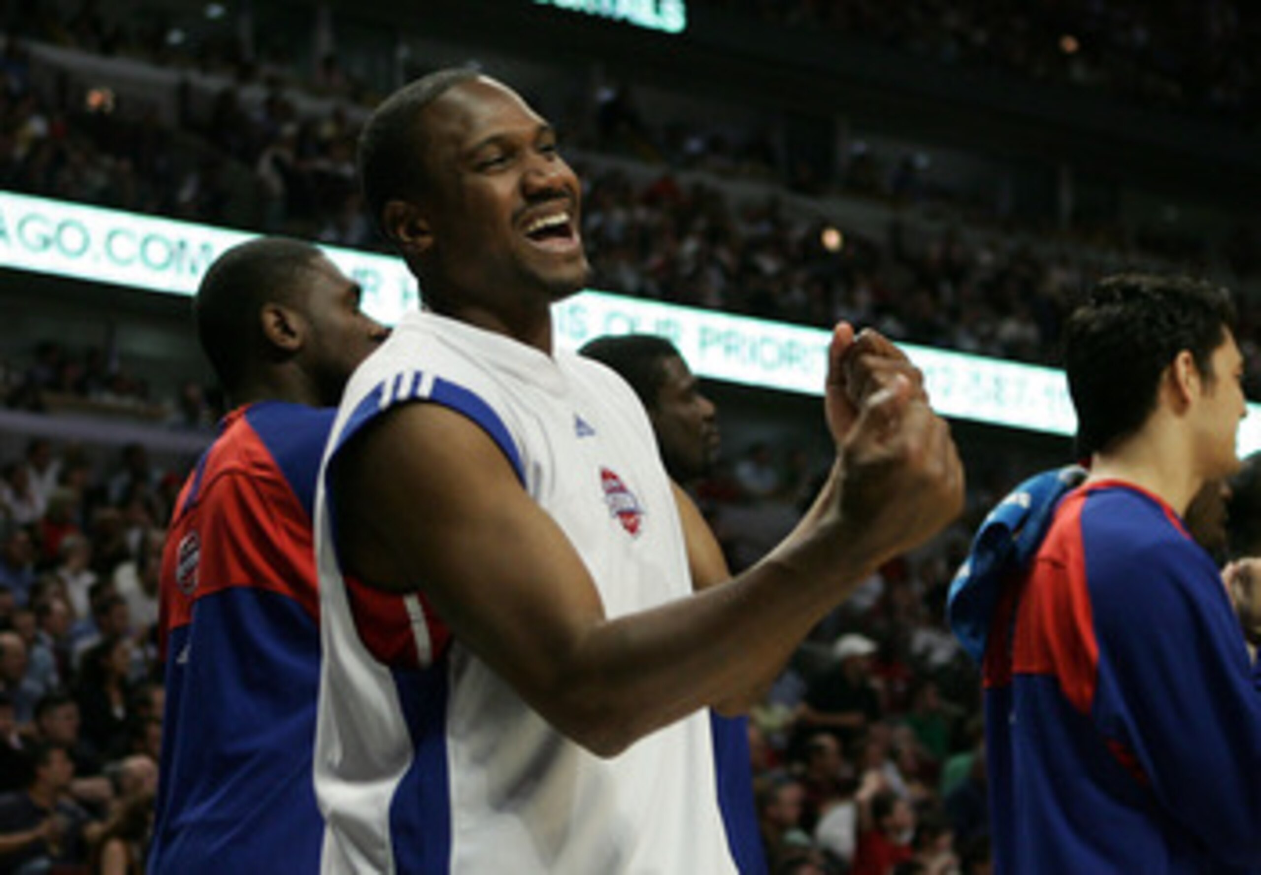 CHICAGO - MAY 10:  Lindsey Hunter #10 of the Detroit Pistons celebrates late in the game on the bench against the Chicago Bulls in Game Three of the Eastern Conference Semifinals during the 2007 NBA Playoffs at the United Center Center on May 10, 2007 in 