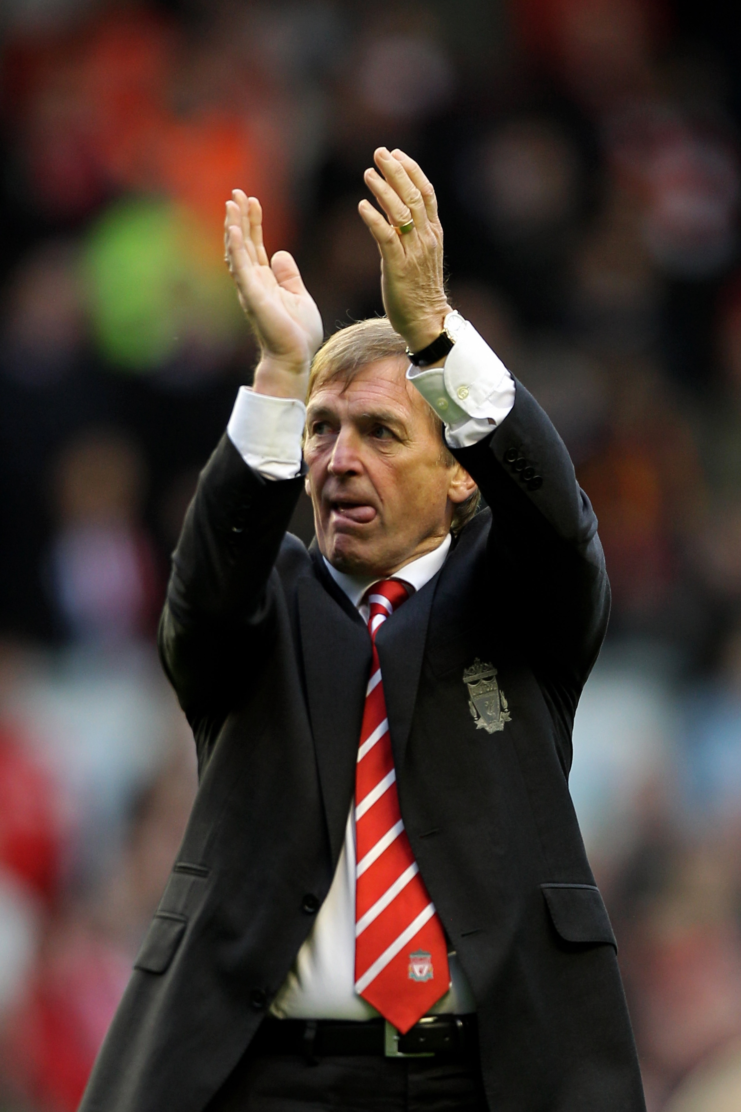LIVERPOOL, ENGLAND - MAY 15:  Liverpool manager Kenny Dalglish applauds the home fans following the final whistle during the Barclays Premier League match between Liverpool and Tottenham Hotspur at Anfield on May 15, 2011 in Liverpool, England.  (Photo by