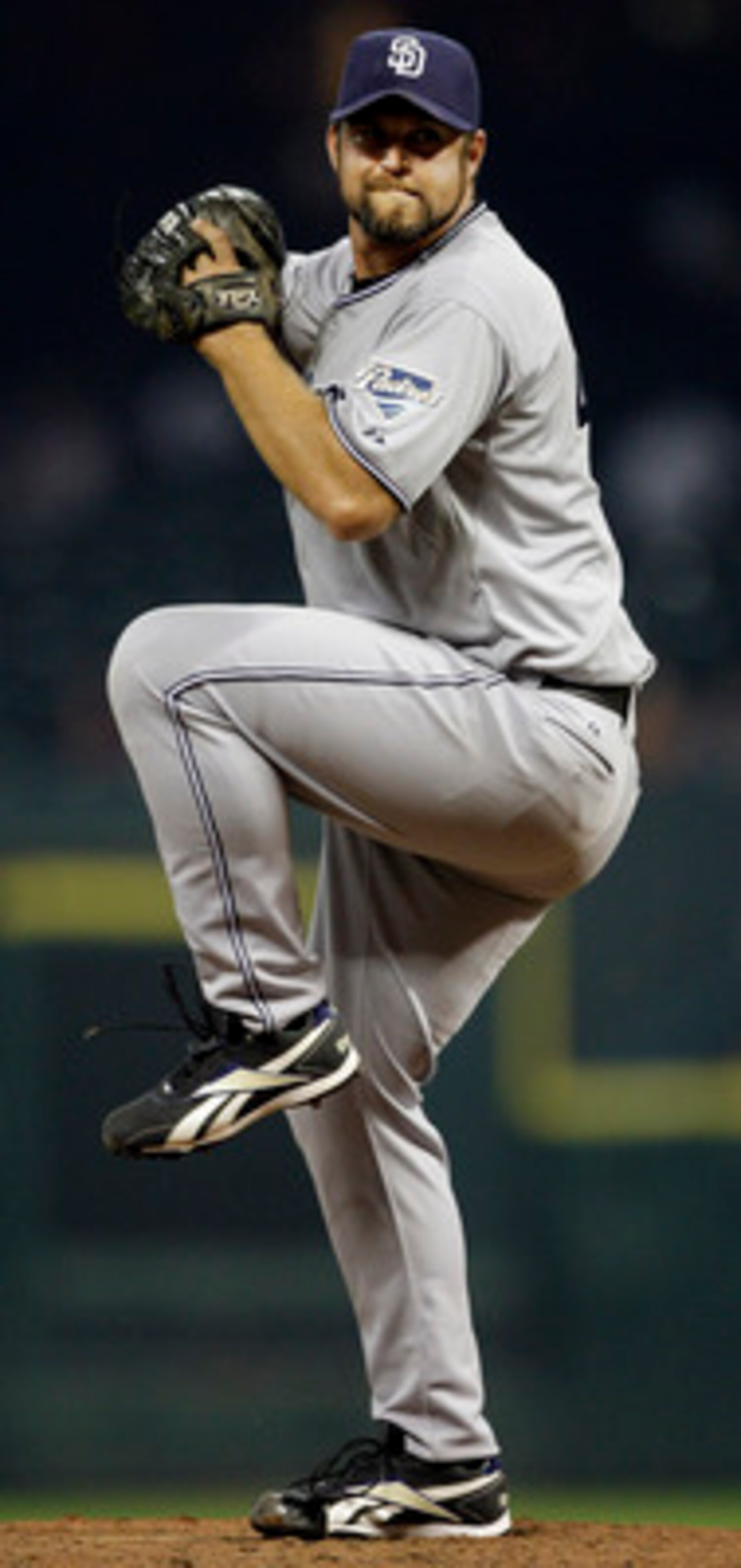 HOUSTON - APRIL 15:  Pitcher Heath Bell #21 of the San Diego Padres throws in the ninth inning against the Houston Astros at Minute Maid Park on April 15, 2011 in Houston, Texas.  (Photo by Bob Levey/Getty Images)