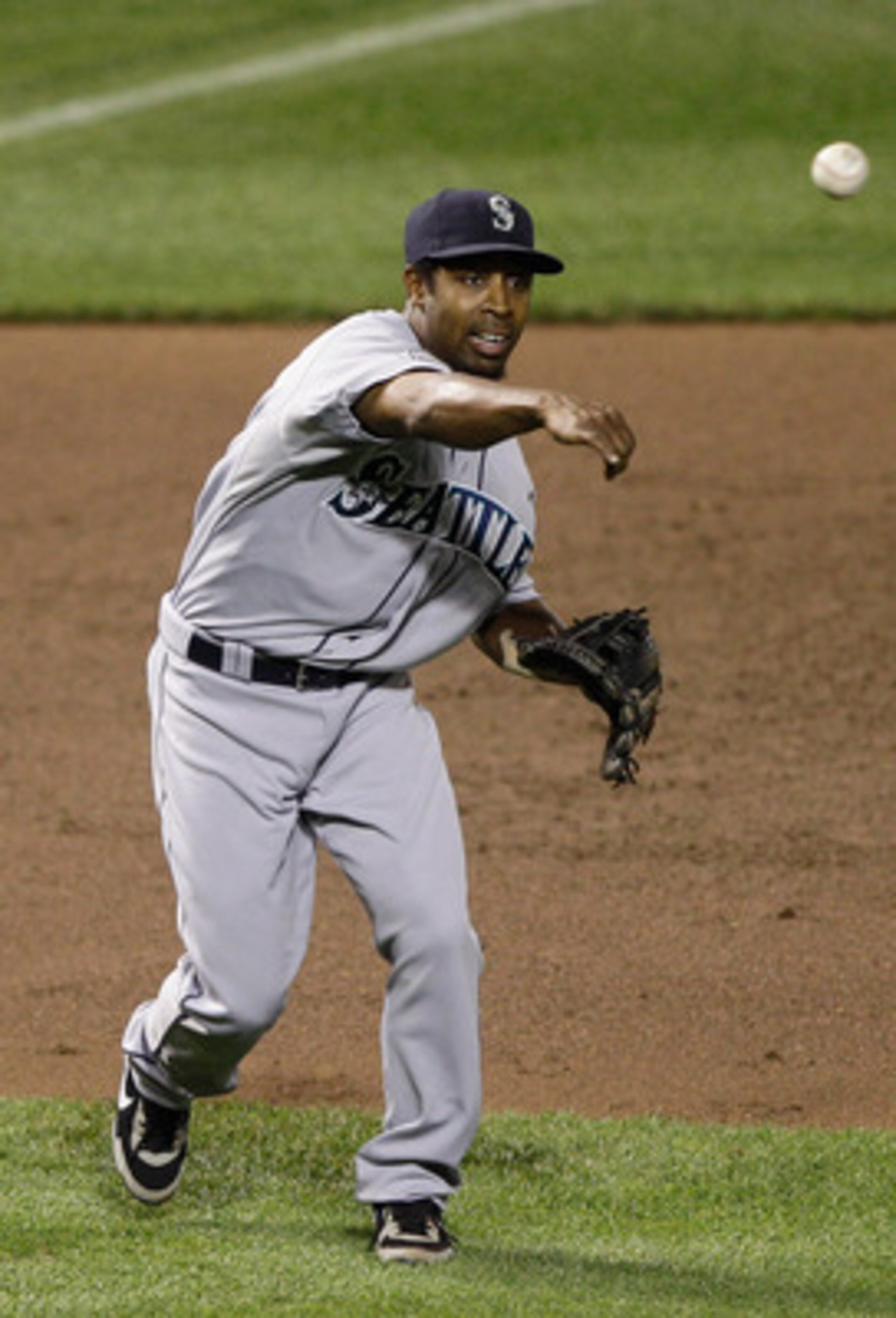 BALTIMORE, MD - MAY 12:  Chone Figgins #9 of the Seattle Mariners in action against the Baltimore Orioles at Oriole Park at Camden Yards on May 12, 2011 in Baltimore, Maryland.  (Photo by Rob Carr/Getty Images)
