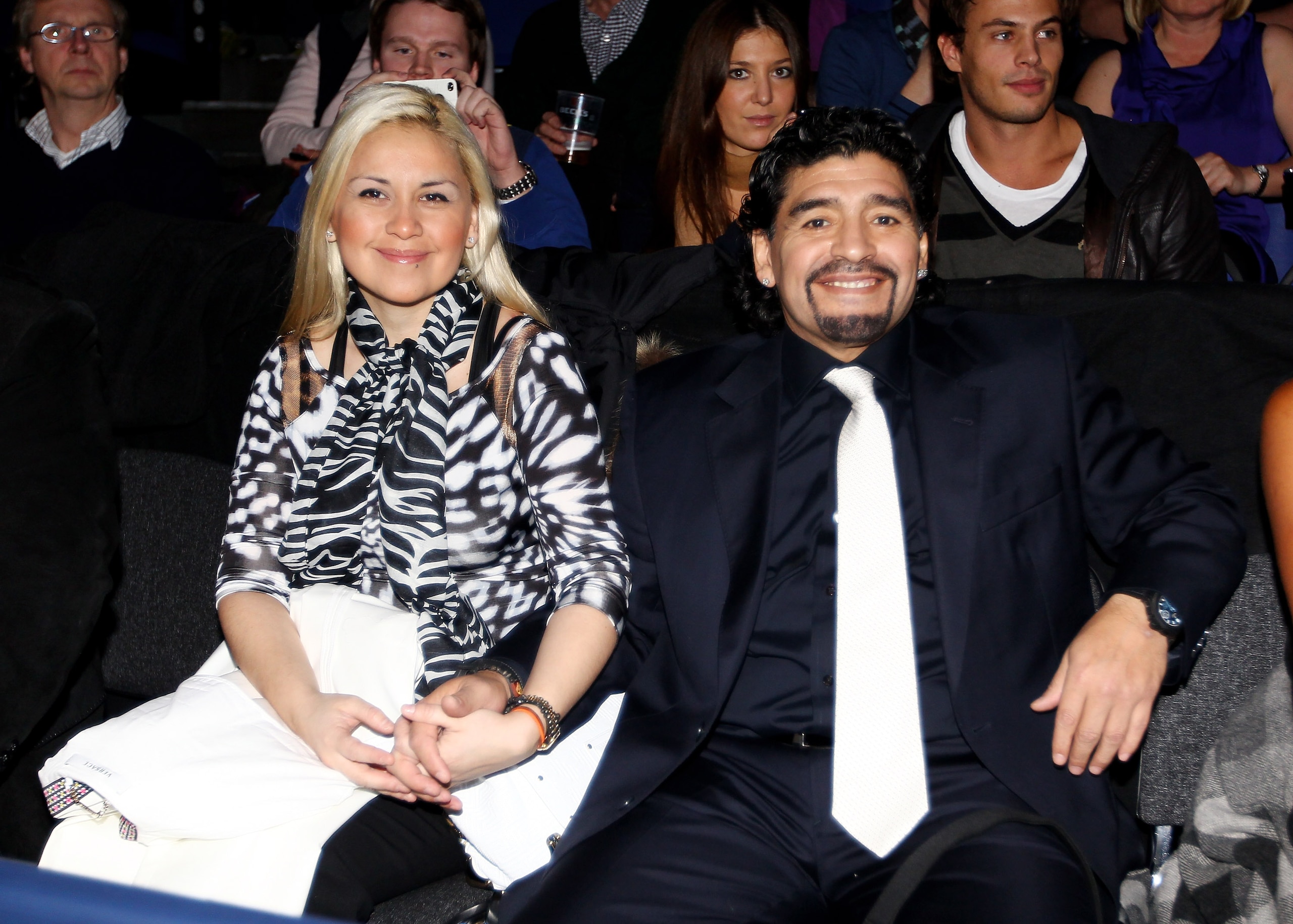 LONDON, ENGLAND - NOVEMBER 28:  Former Argentinian footballer Diego Maradona and Veronica Ojeda attand the men's final between Rafael Nadal of Spain and Roger Federer of Switzerland during the ATP World Tour Finals at O2 Arena on November 28, 2010 in Lond