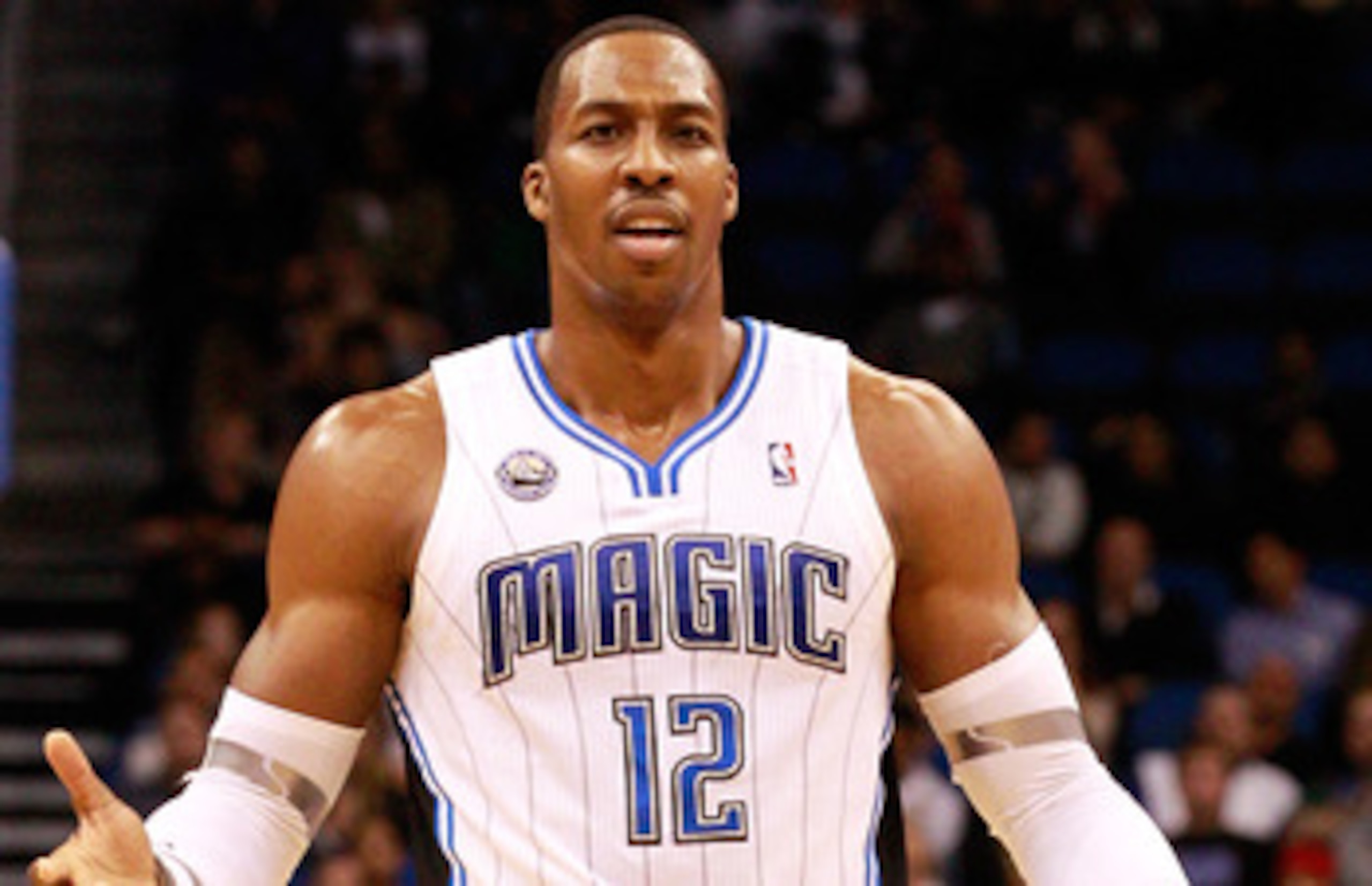 ORLANDO, FL - FEBRUARY 08:  Dwight Howard #12 of the Orlando Magic reacts to a foul during the game against the Los Angeles Clippers at Amway Arena on February 8, 2011 in Orlando, Florida.  NOTE TO USER: User expressly acknowledges and agrees that, by dow