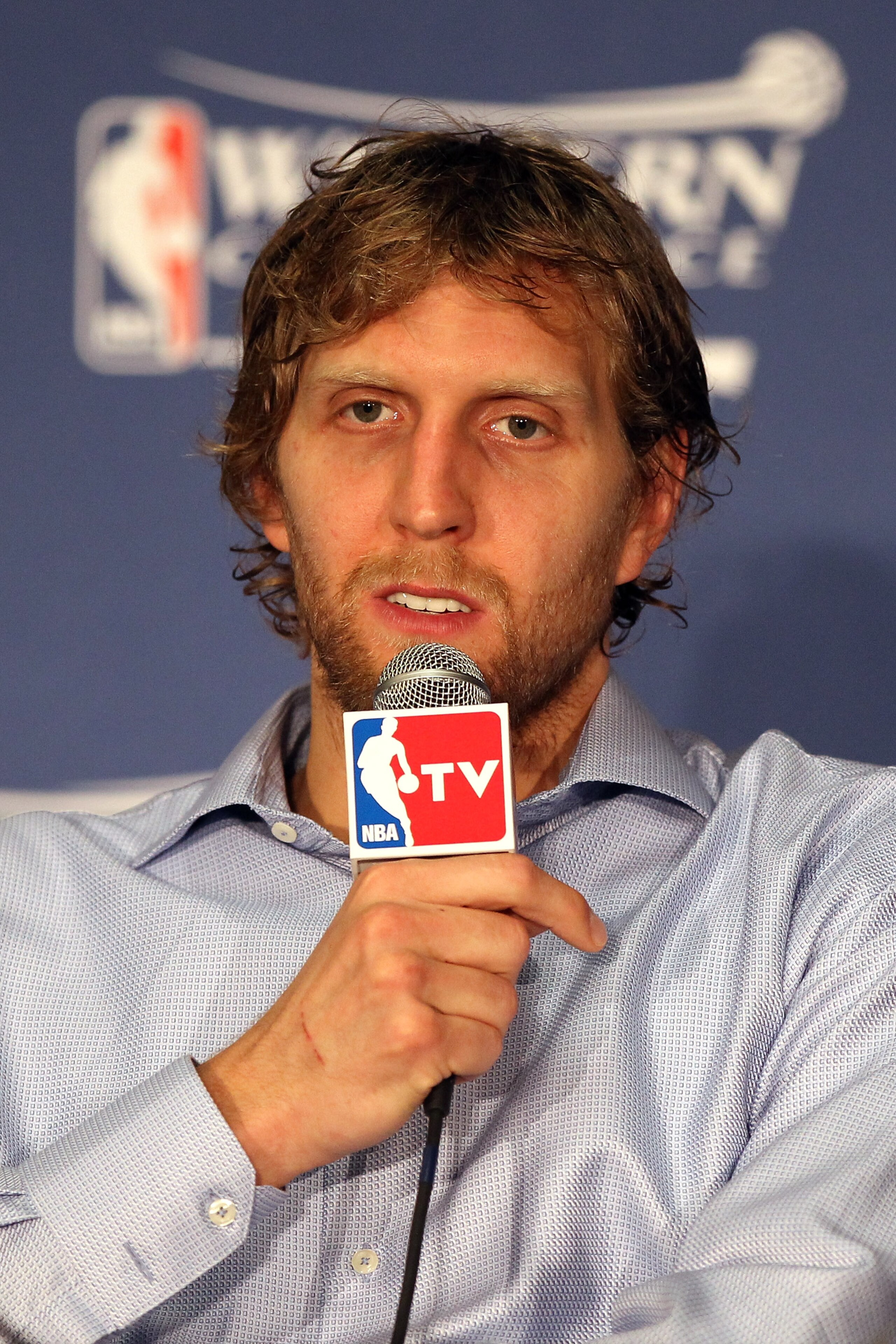 OKLAHOMA CITY, OK - MAY 23:  Dirk Nowitzki #41 of the Dallas Mavericks answers questions after the Mavericks defeated the Oklahoma City Thunder 112-105 in overtime in Game Four of the Western Conference Finals during the 2011 NBA Playoffs at Oklahoma City
